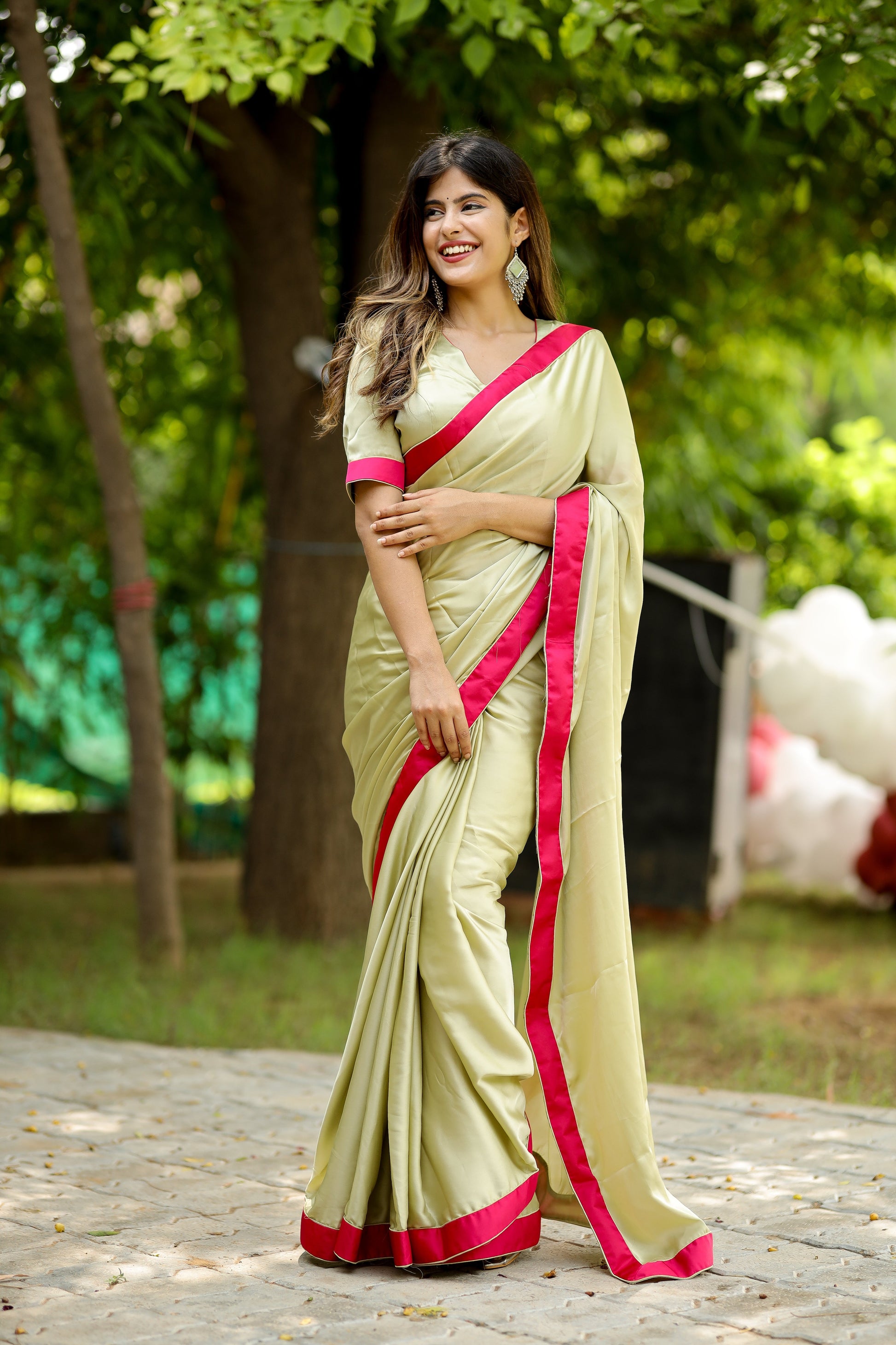 Captivating Green Light Satin Crepe Saree Rani Satin Border