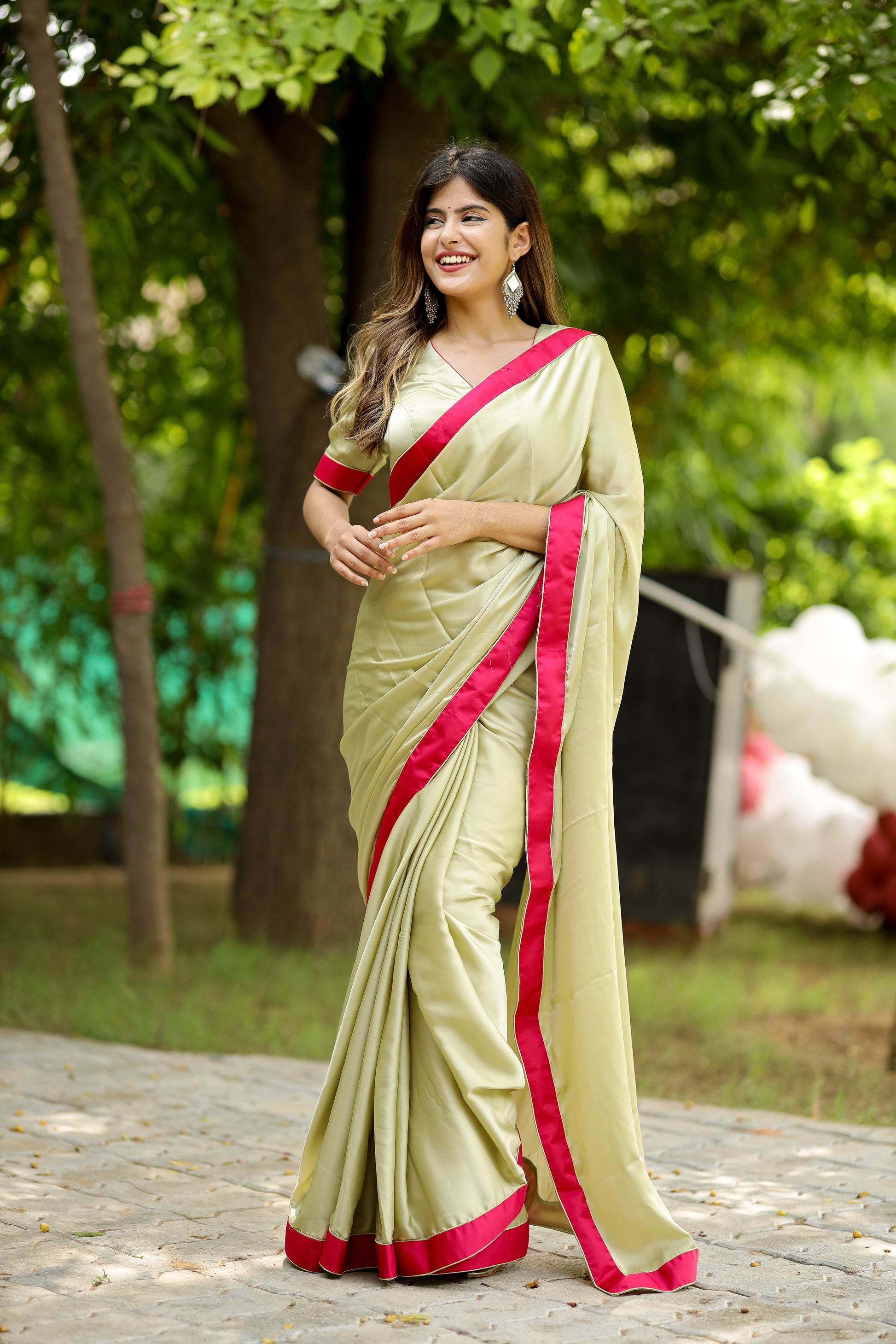Captivating Green Light Satin Crepe Saree Rani Satin Border