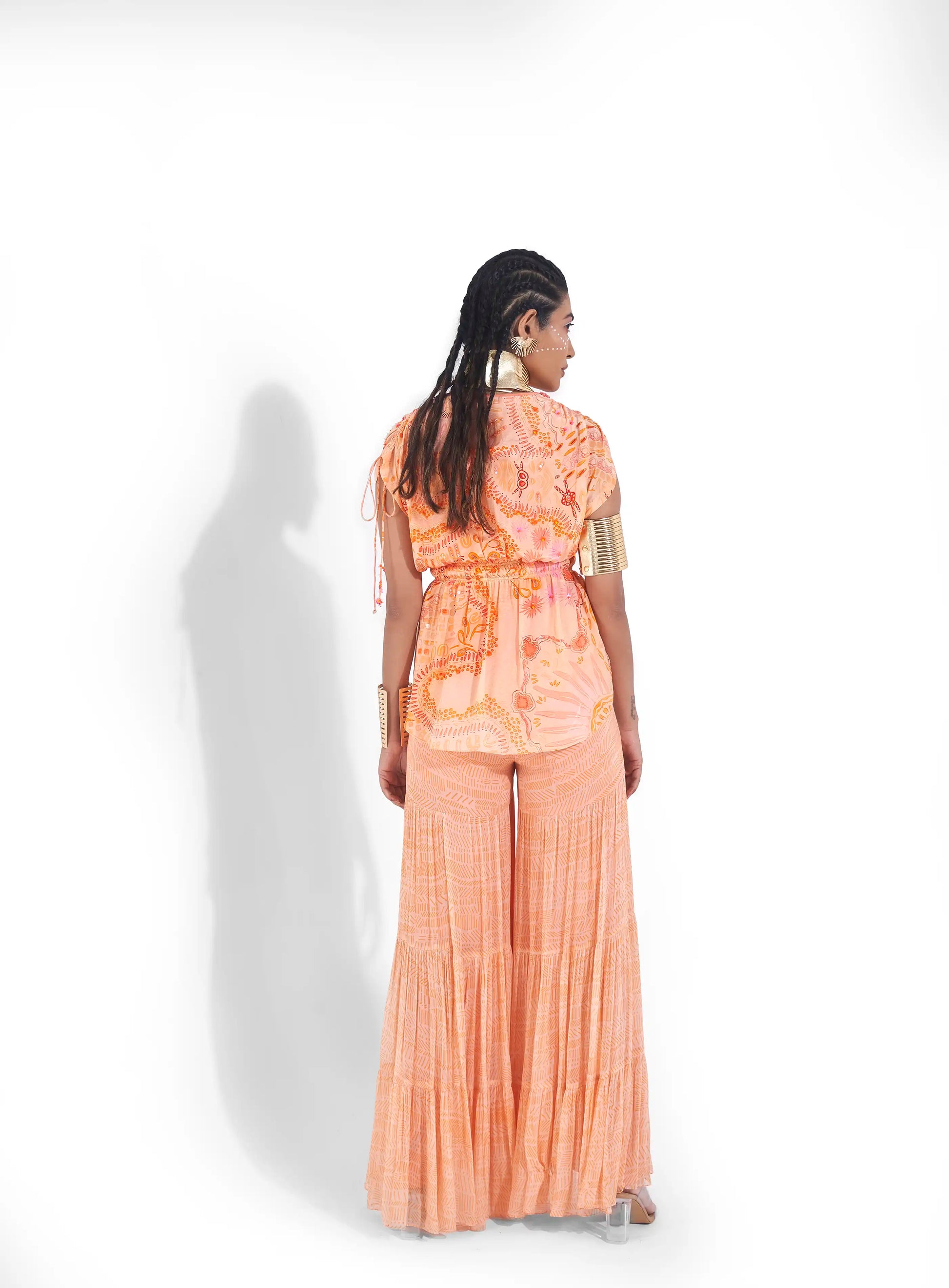 Comfortable Peach Sunset Orange Georgette Varya Top Sharara Set