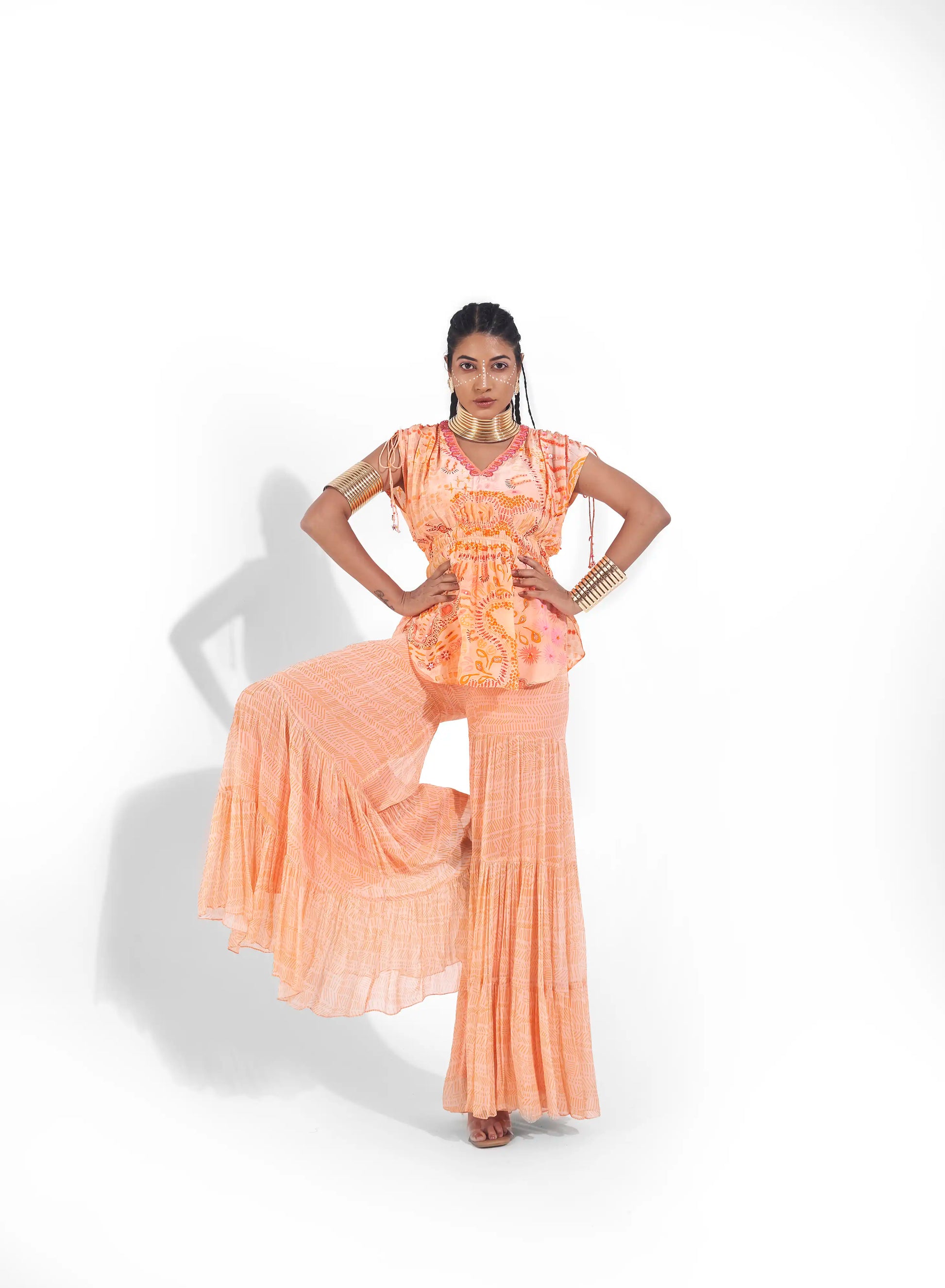 Comfortable Peach Sunset Orange Georgette Varya Top Sharara Set