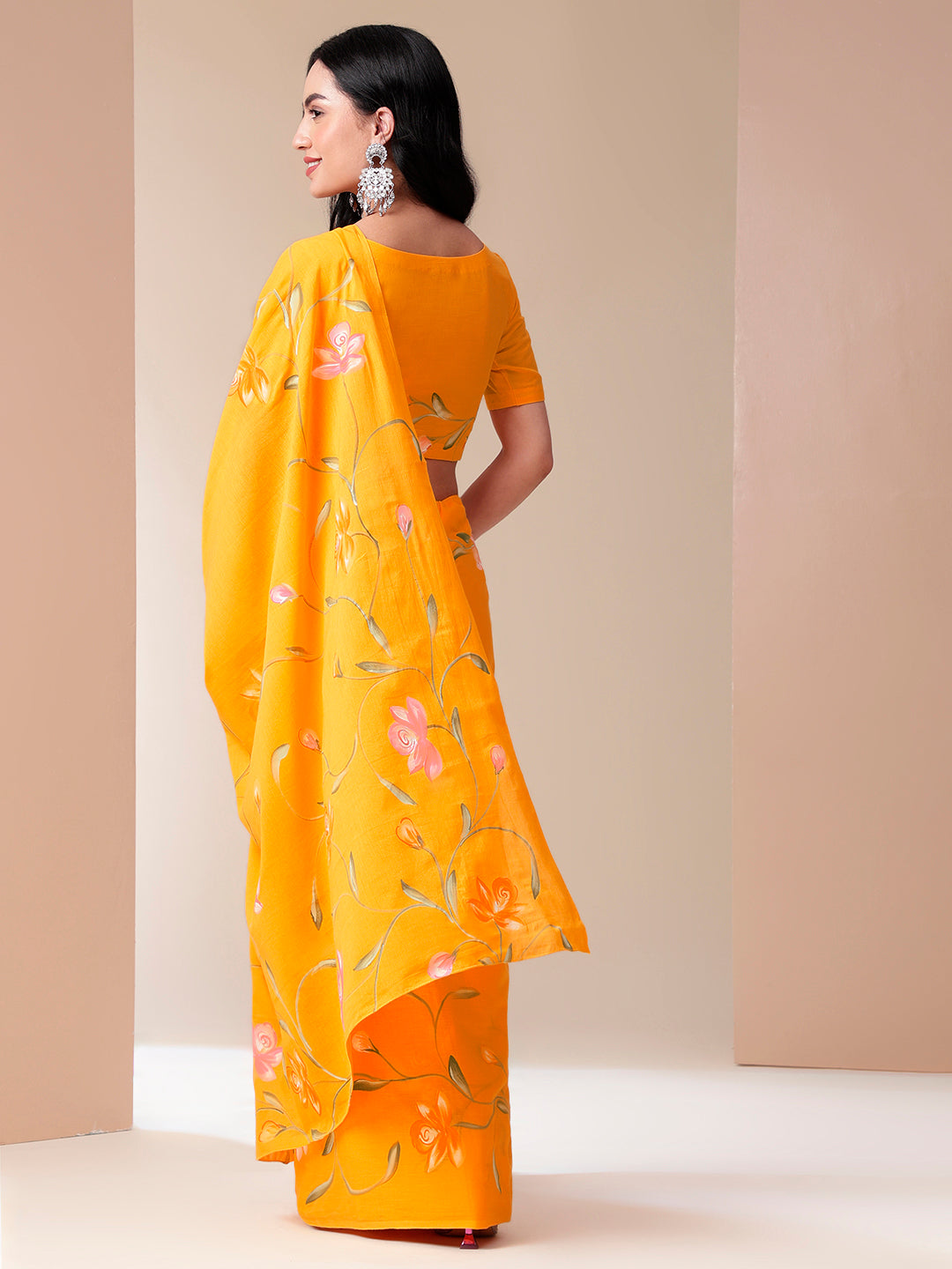 Captivating Orange Cotton Malmal Saree Handpainted Floral