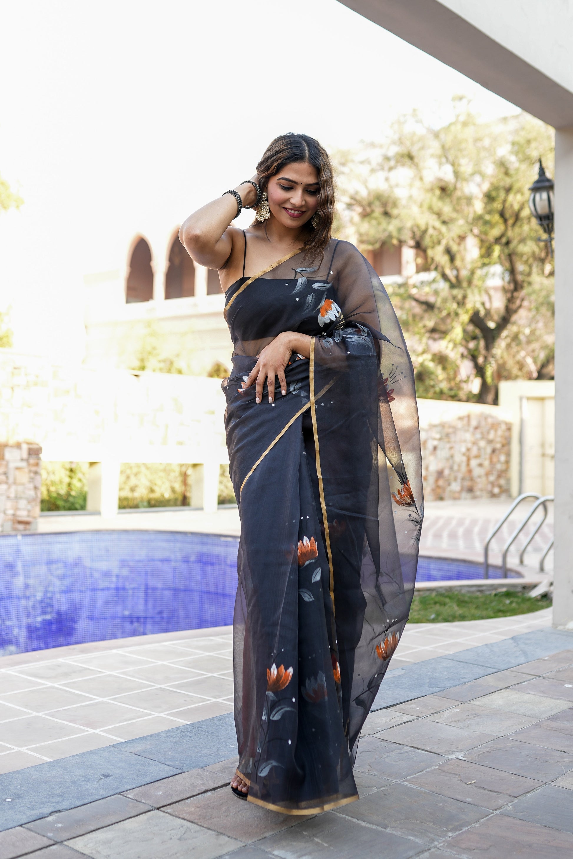 Elegant Black Organza Handpainted Saree Gold Zari Floral
