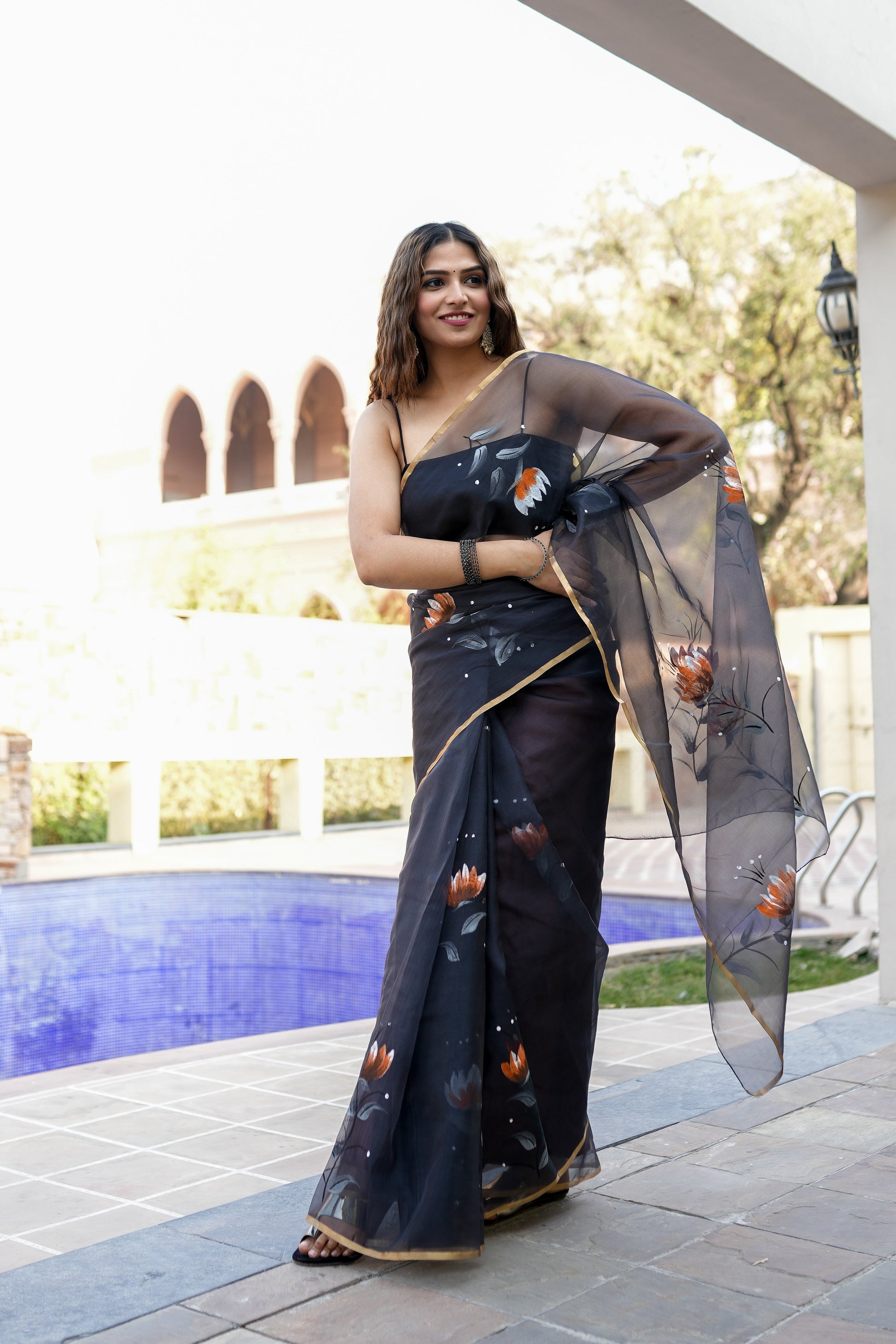 Elegant Black Organza Handpainted Saree Gold Zari Floral