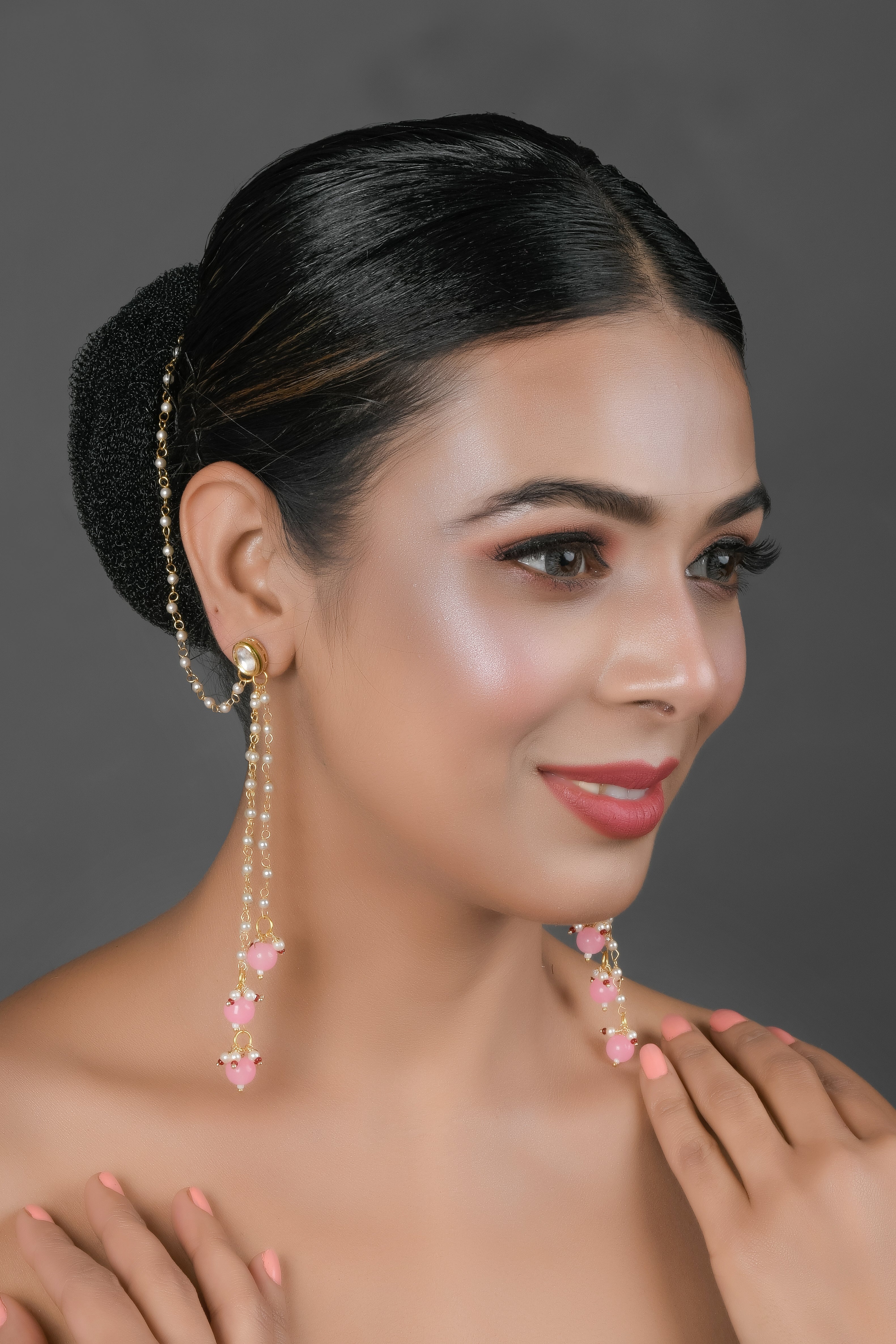 Gold and Pink Tone Kundan Inspired Pearl Tassel Earrings with Hair Chain
