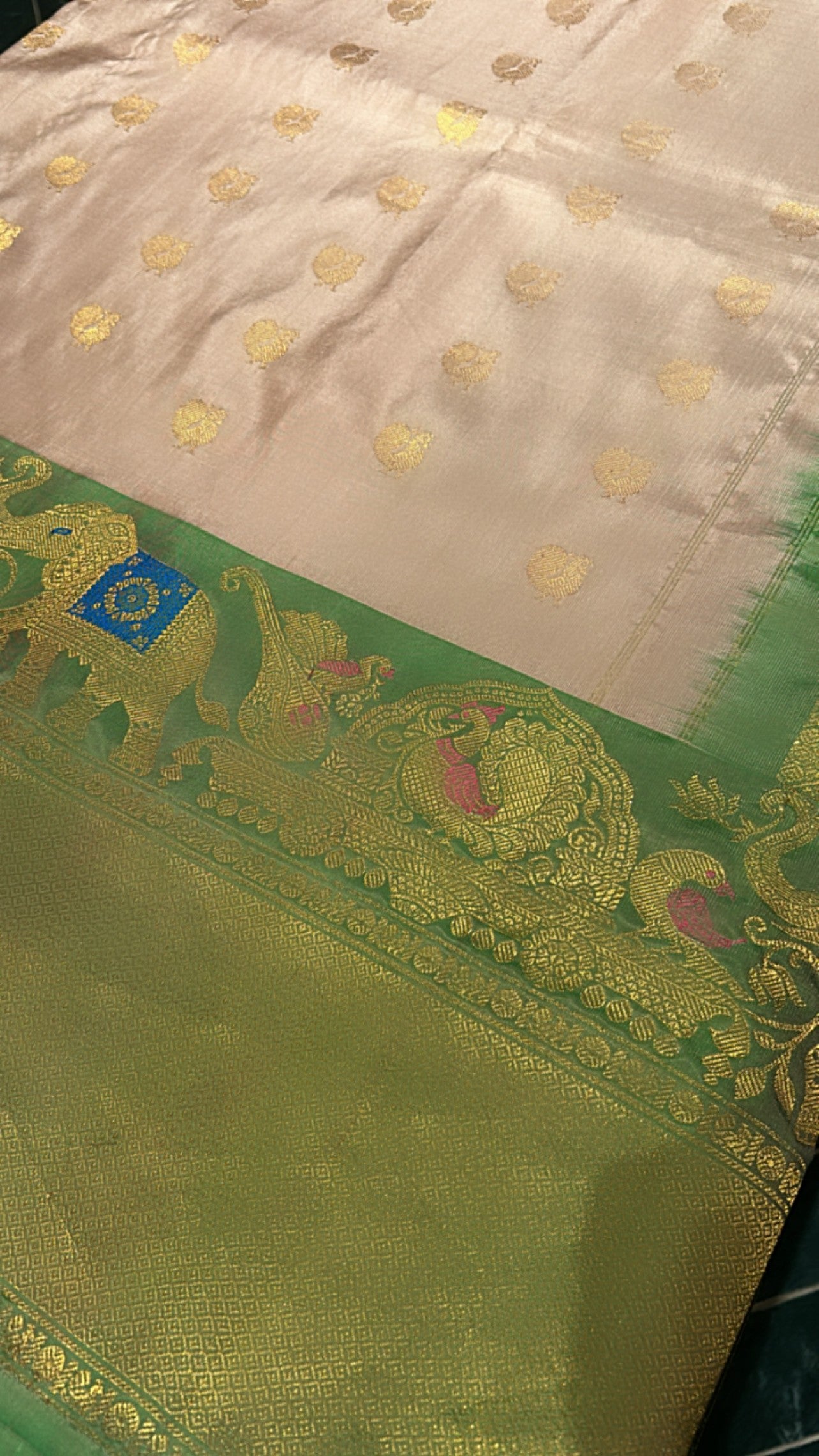 Beige Gadwal Silk Saree Green Border Gold Zari Elephant Motifs
