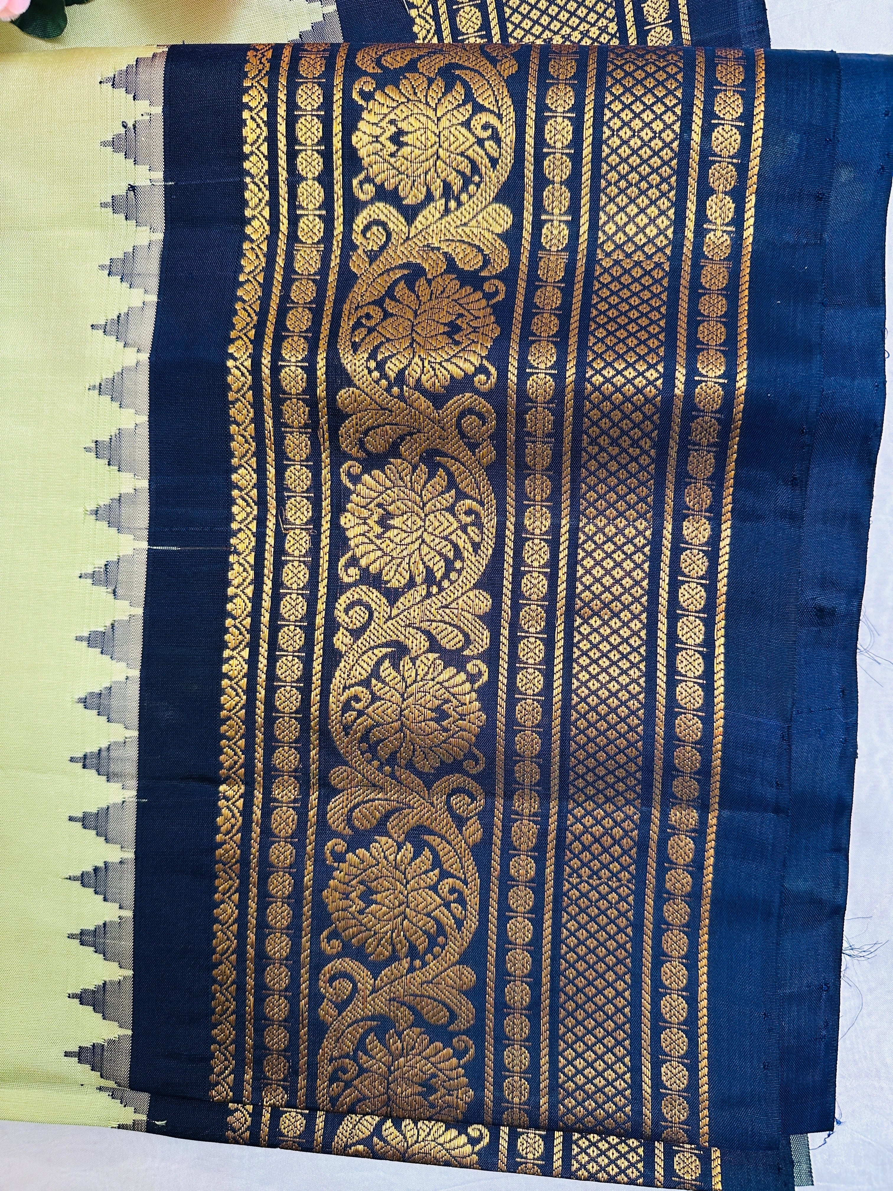 Mesmerizing Green Olive Gadwal Pattu Saree Gold Zari Buttas Navy Border