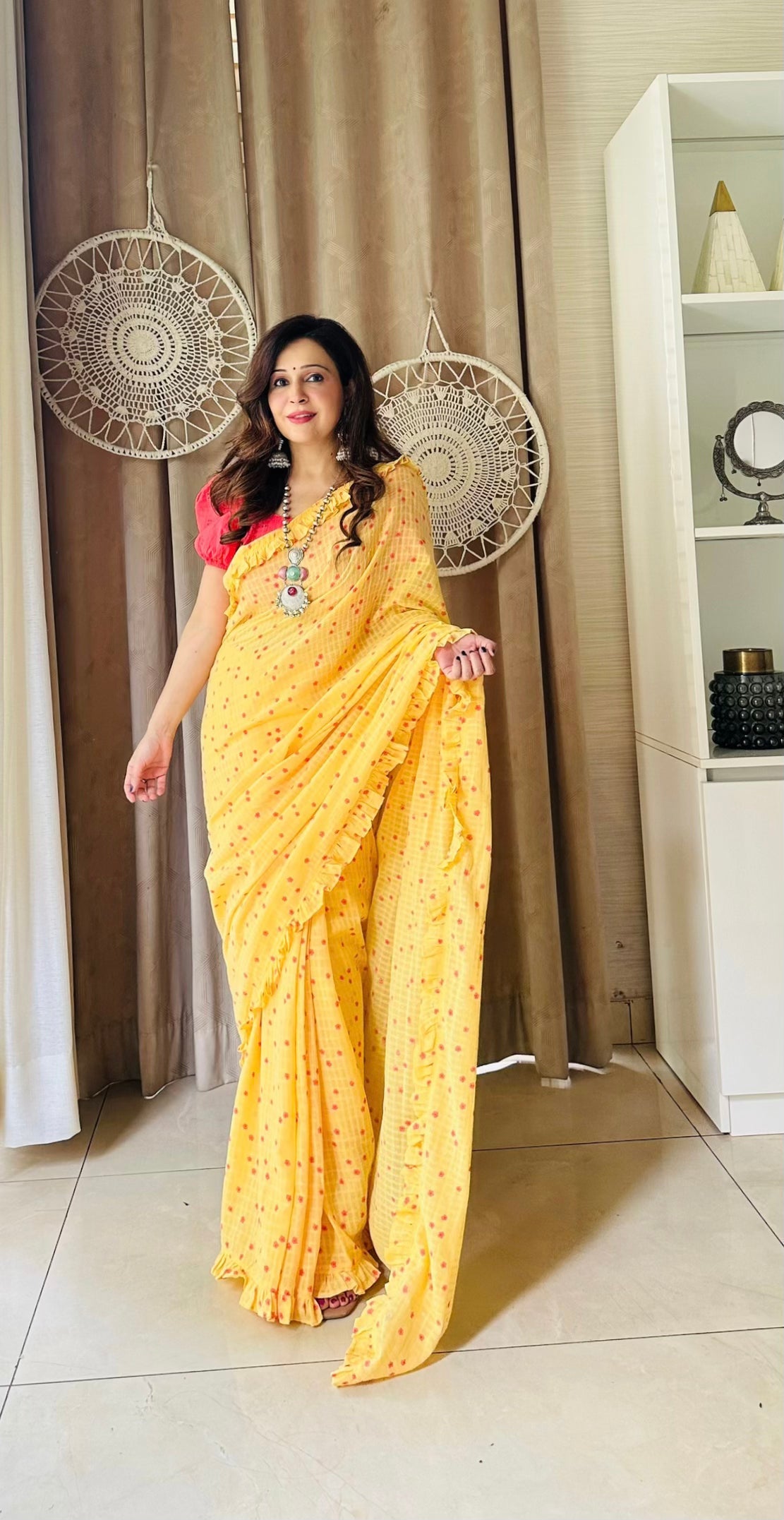 Elegant Yellow Coral Red Cotton Floral Print Saree Ruffle Border