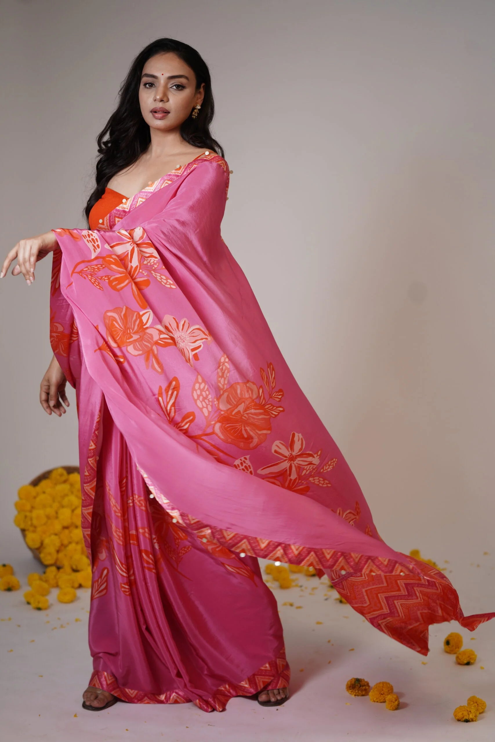 Mandhaara Moonga Pink & Orange Floral Crepe Saree with Zigzag Border - Festive Saree