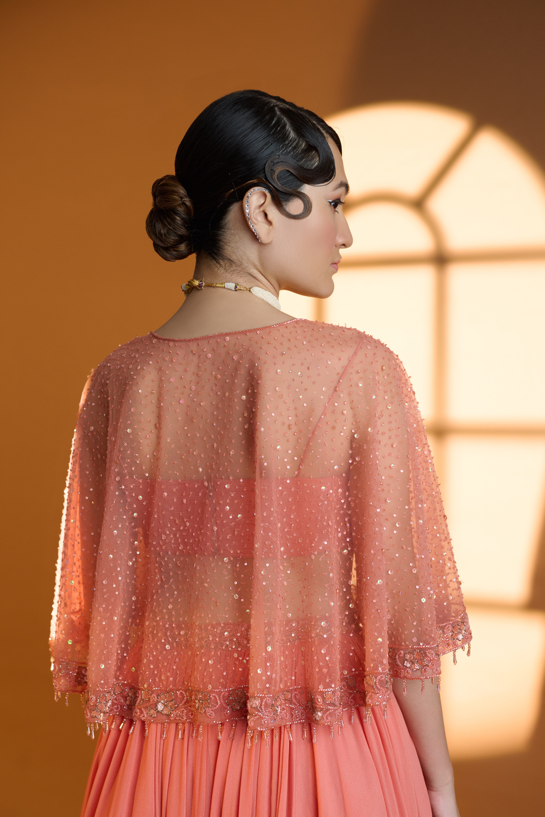 Ethereal Ivory Apricot Georgette Cape Lehenga Ensemble Gold Speckles
