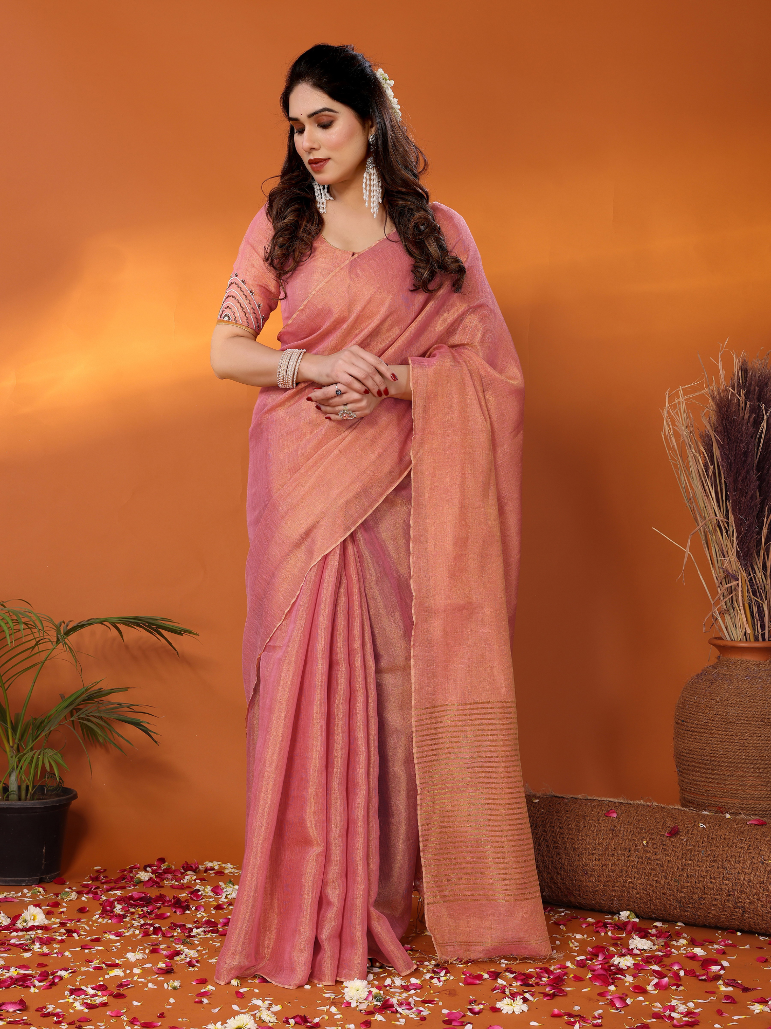 Enchanting Onion Pink Tissue Linen Rukmani Saree Hand Embroidery