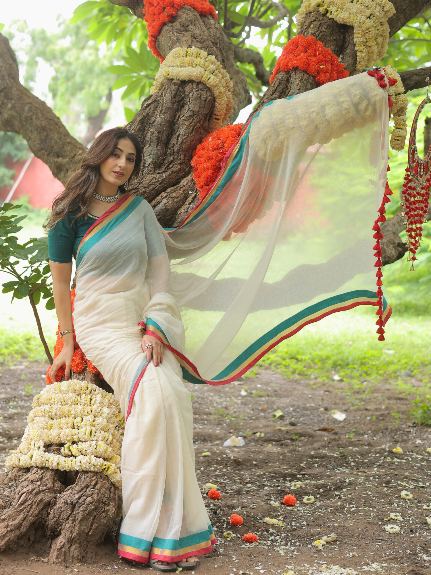 Rama ivory cotton saree with embroidered blouse