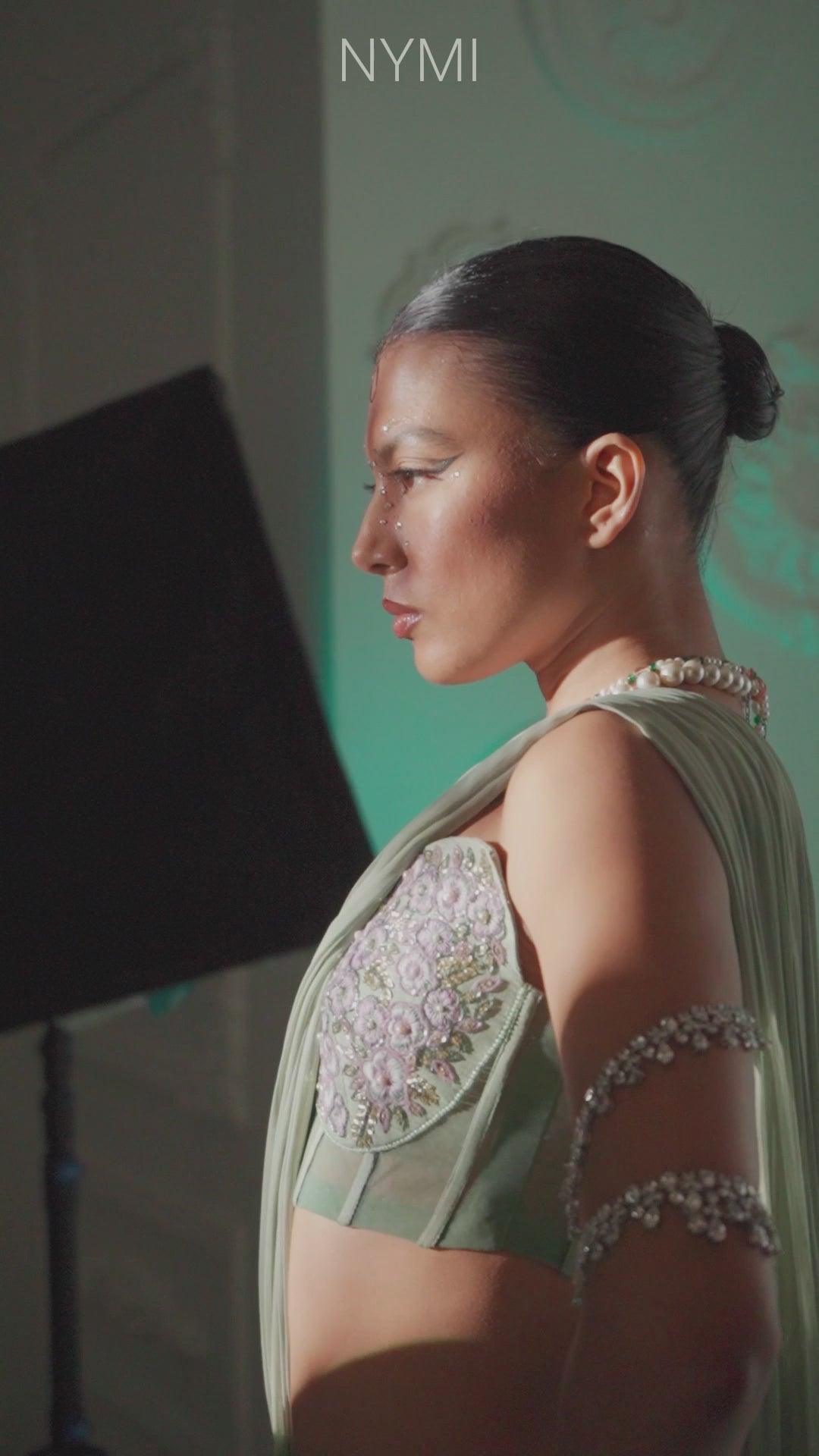 Load video: Ethereal Sage Green Dupian Silk Georgette Corset Saree Floral Embroidery