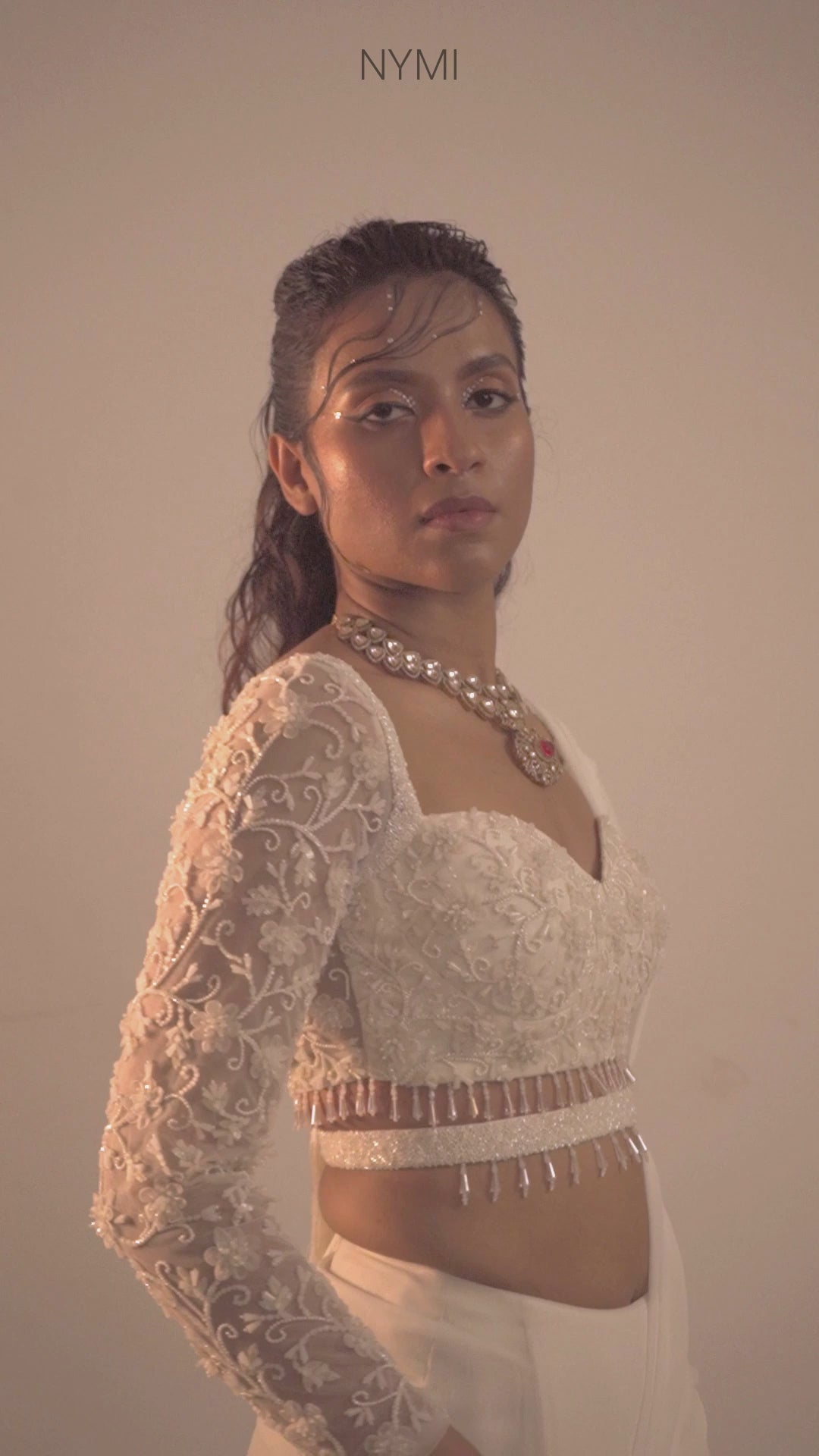 Load video: Alluring Ivory Georgette Regal Frost Lehenga Elegance Embroidered