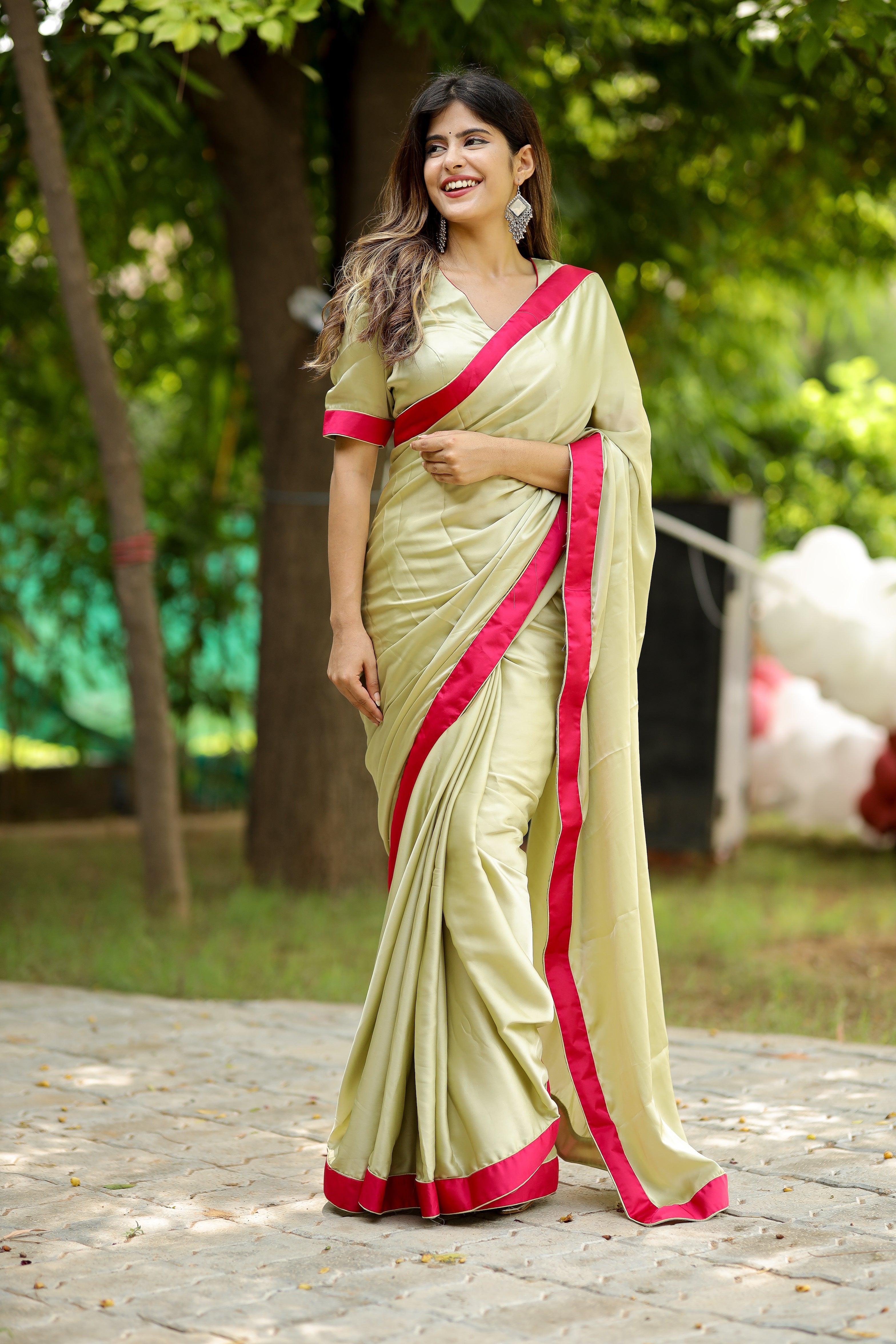 Captivating Green Light Satin Crepe Saree Rani Satin Border