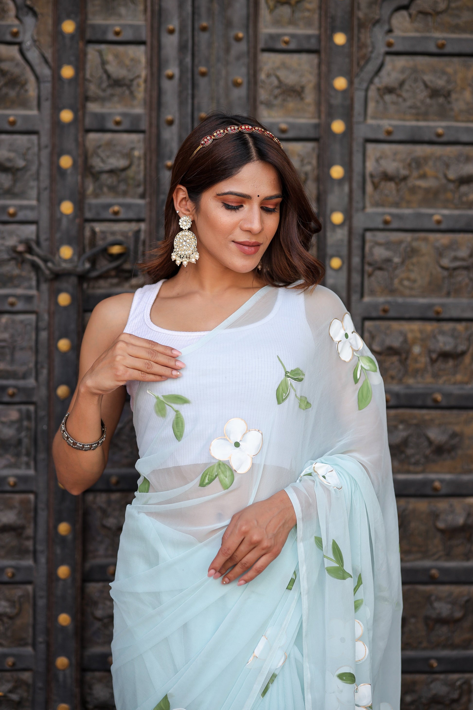 Serene Light Blue Handpainted Chiffon Saree Floral