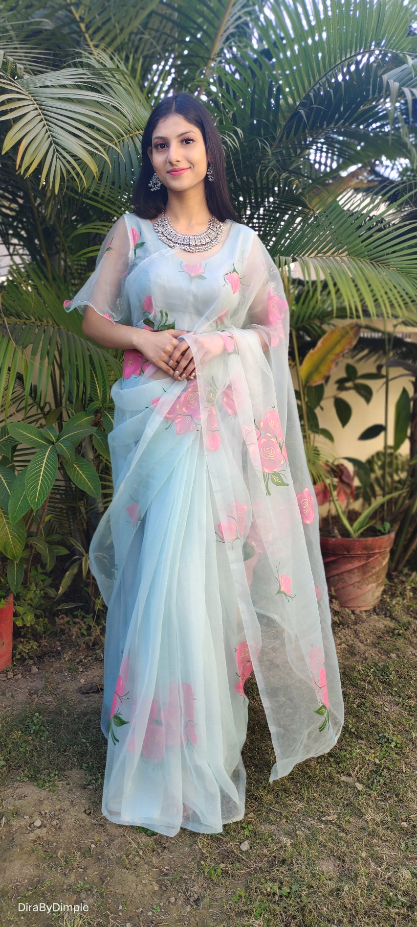 Elegant Blue Powder Organza Handpainted Floral Saree Golden Highlights