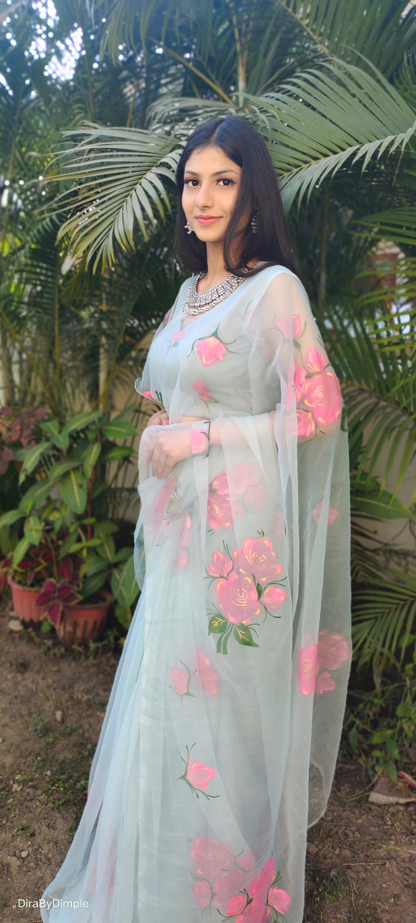 Elegant Blue Powder Organza Handpainted Floral Saree Golden Highlights