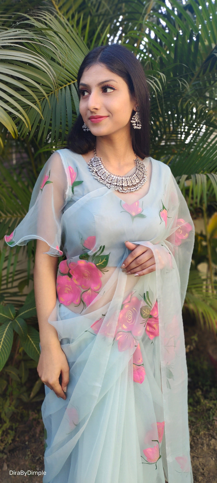 Elegant Blue Powder Organza Handpainted Floral Saree Golden Highlights