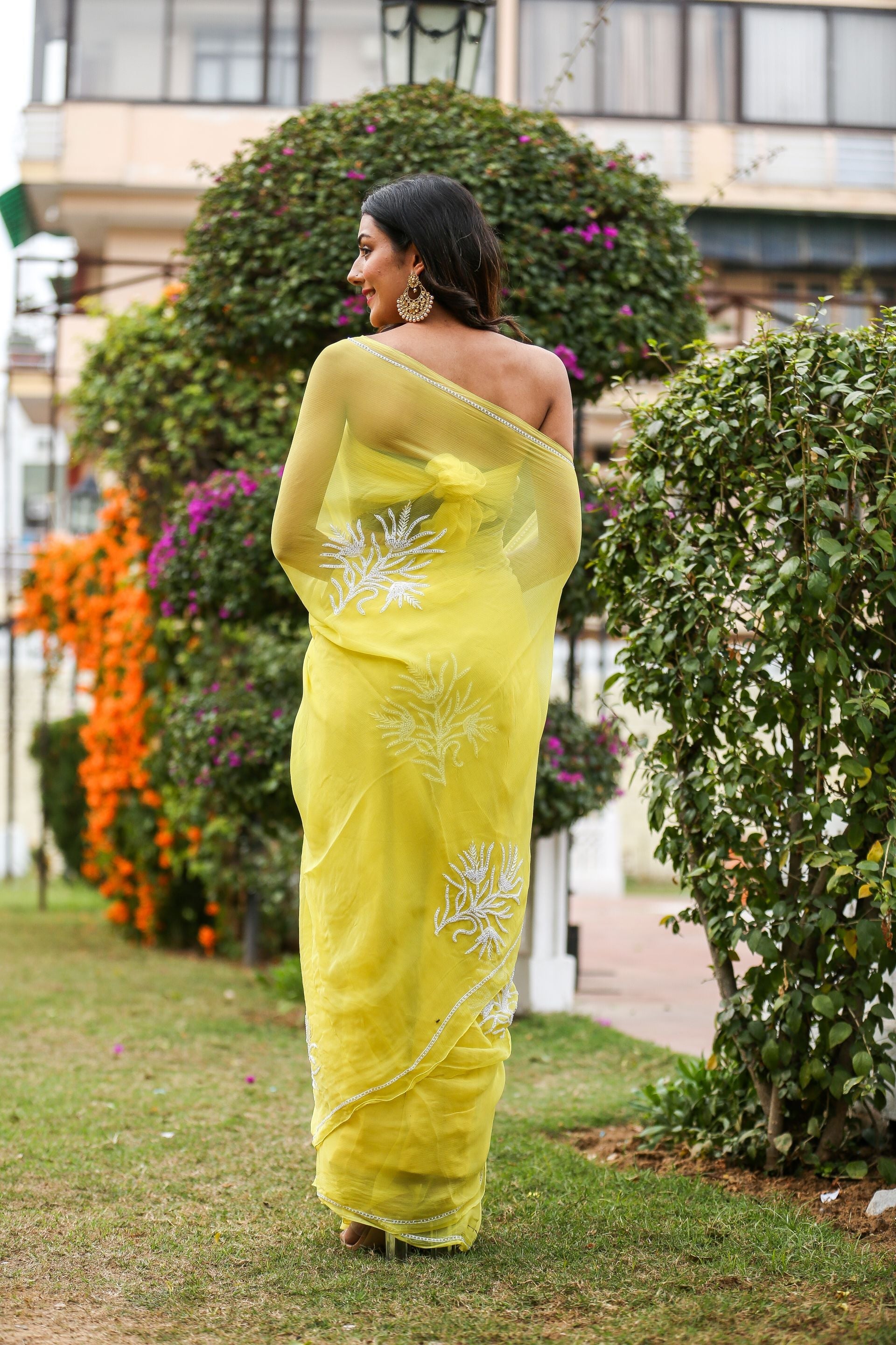 Classy Pastel Yellow Chiffon Saree Pearl Work Nature Inspired