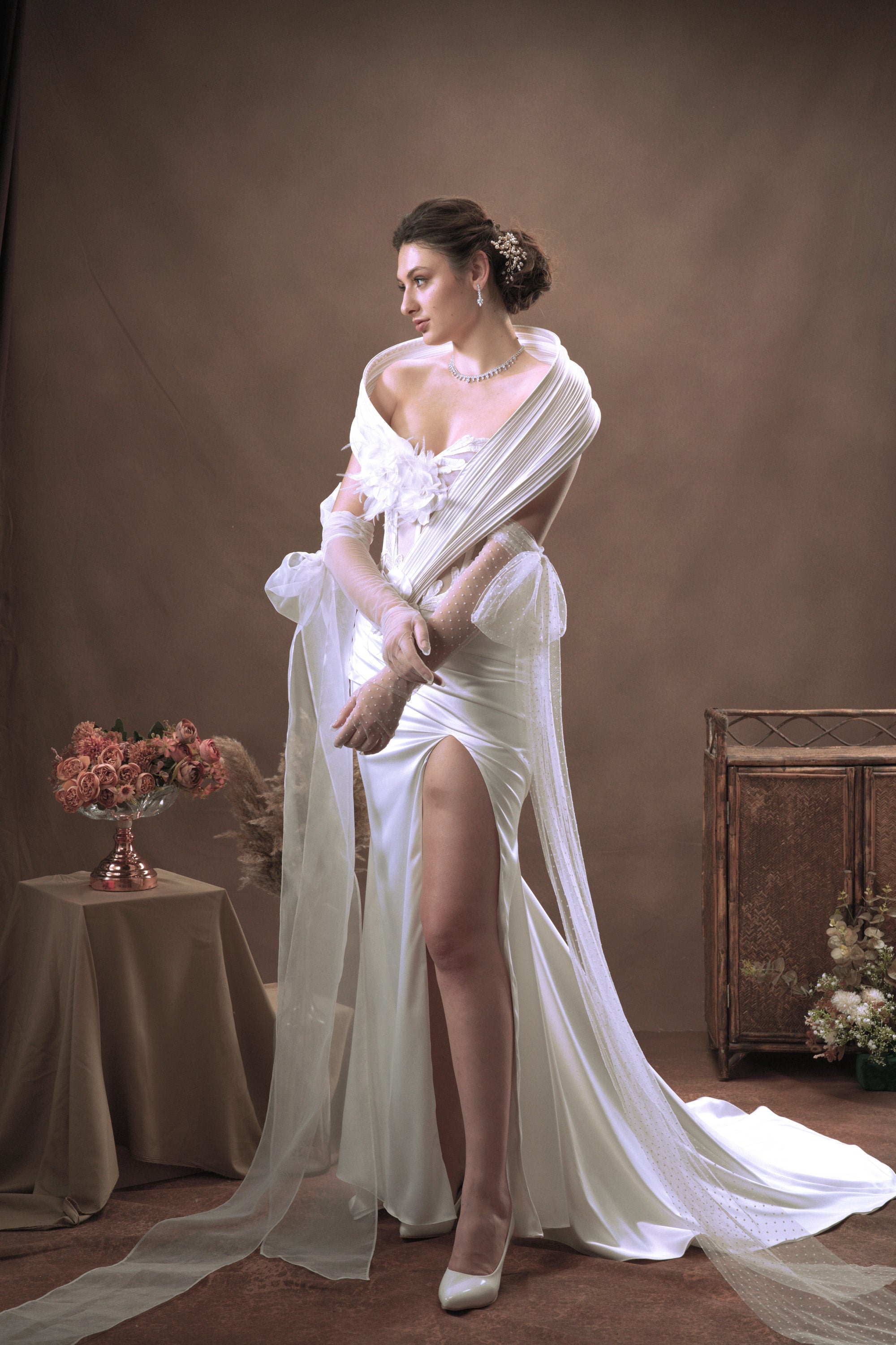 Long gloves extending past elbow with fitted shape