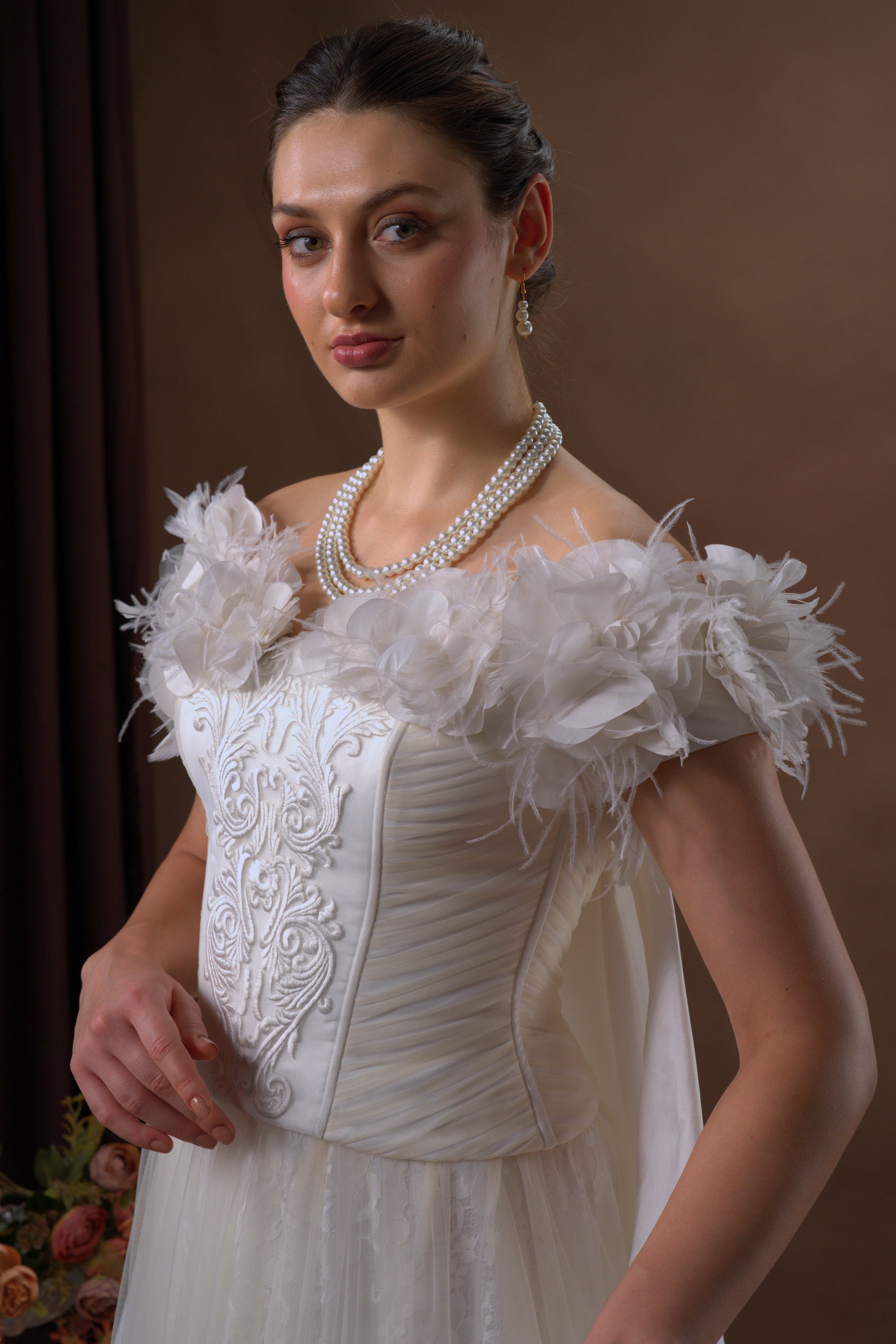 Fitted gown with straight silhouette and narrow skirt