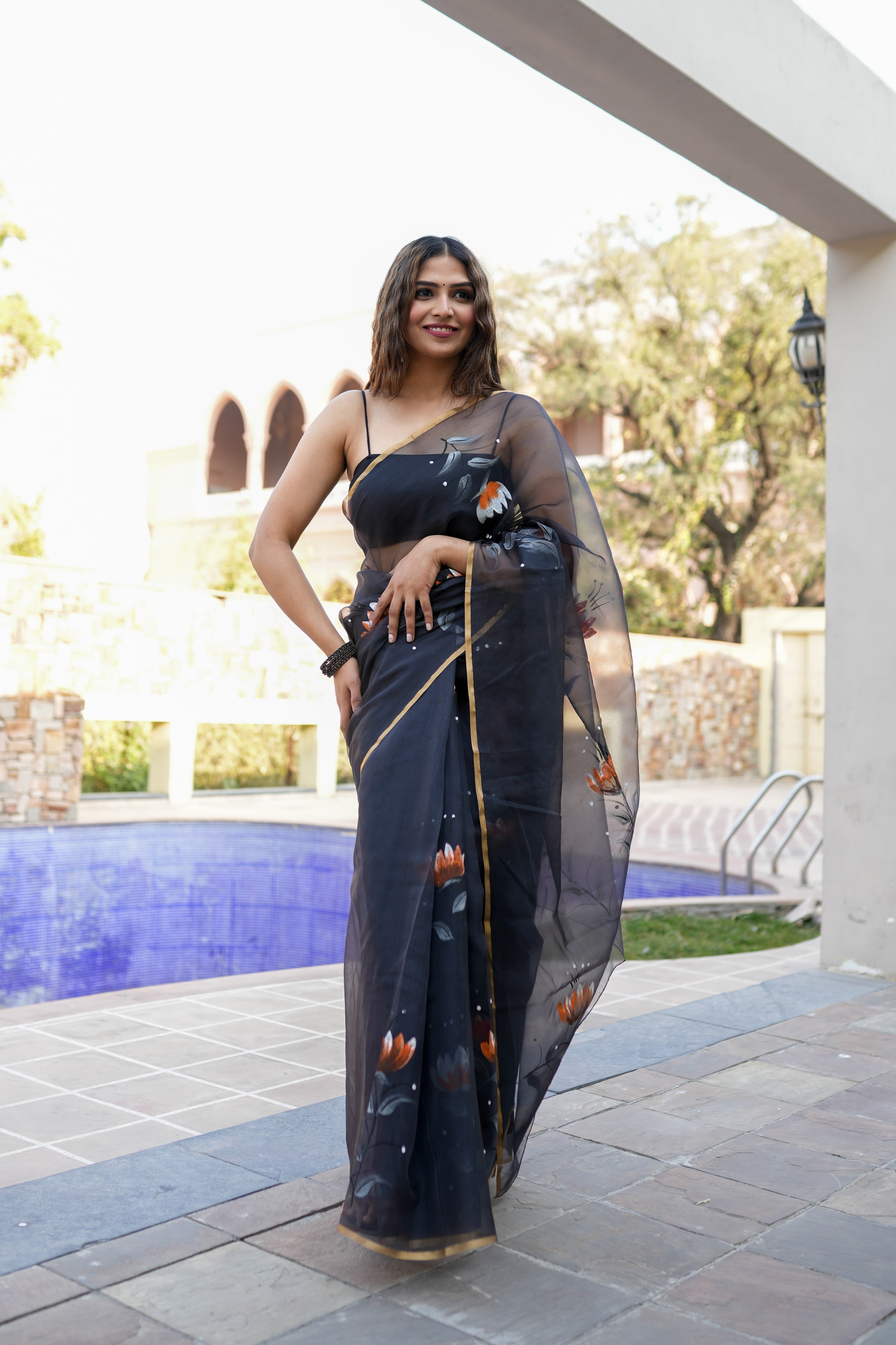 Elegant Black Organza Handpainted Saree Gold Zari Floral