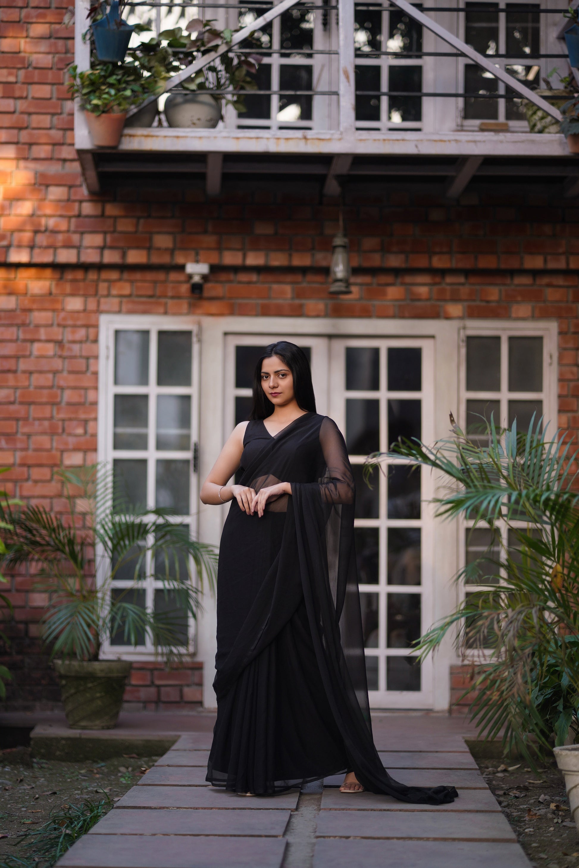 Sophisticated Black Plain Chiffon Saree Raw Silk Blouse