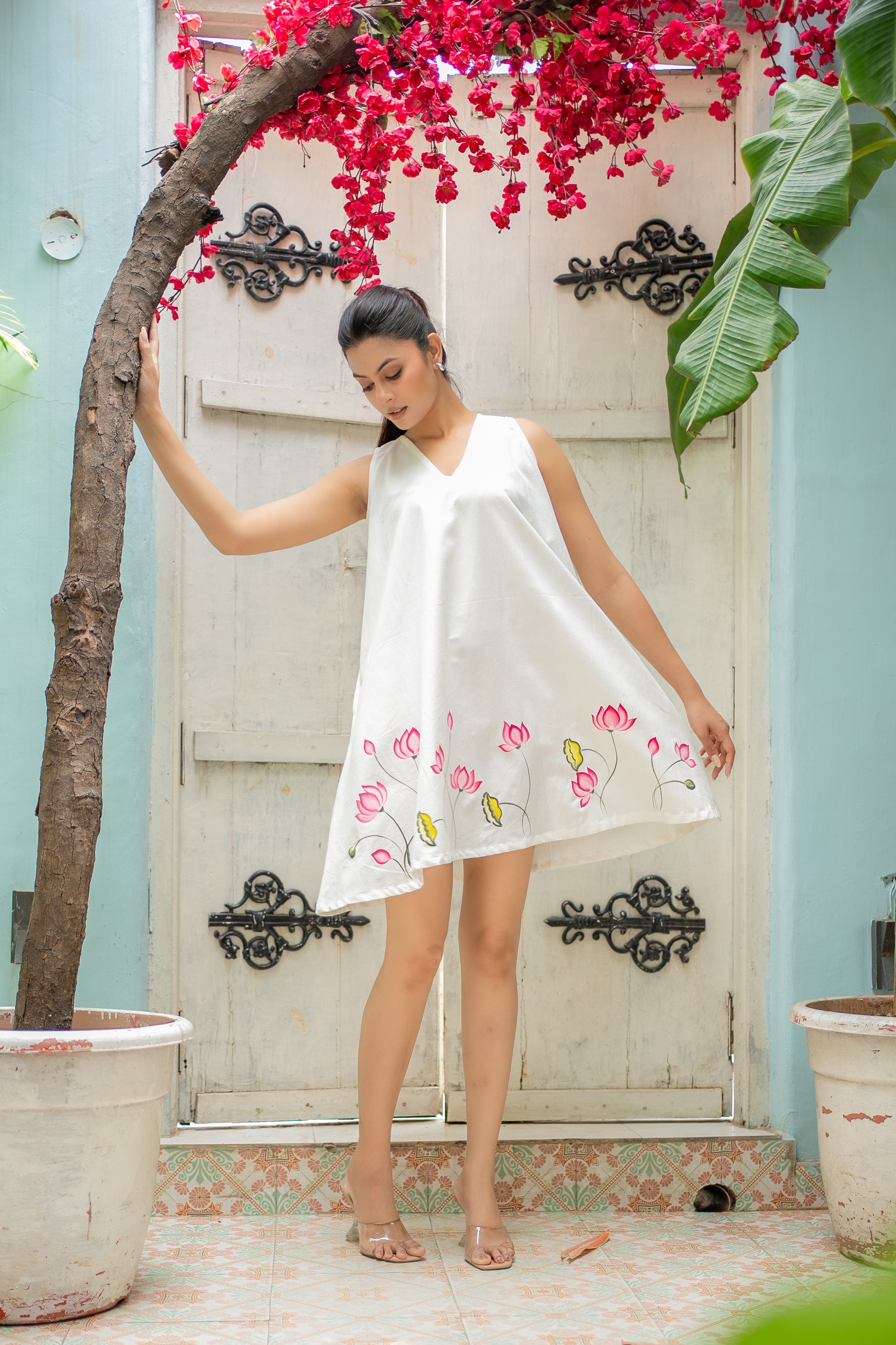 Lotus Whisper white dress with handpainted soft pink lotus flowers.