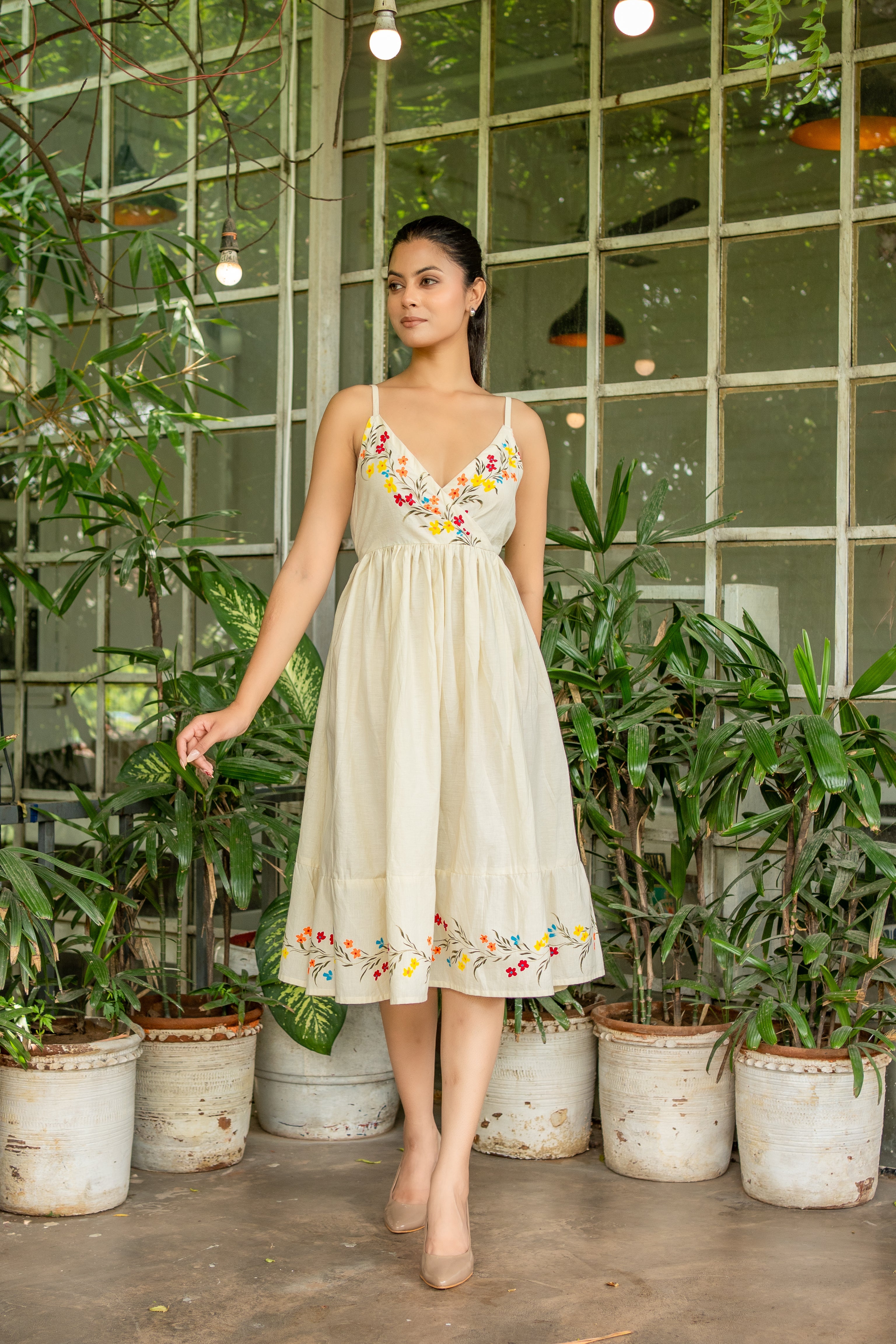 Golden Dawn pale yellow dress with handpainted floral motifs.