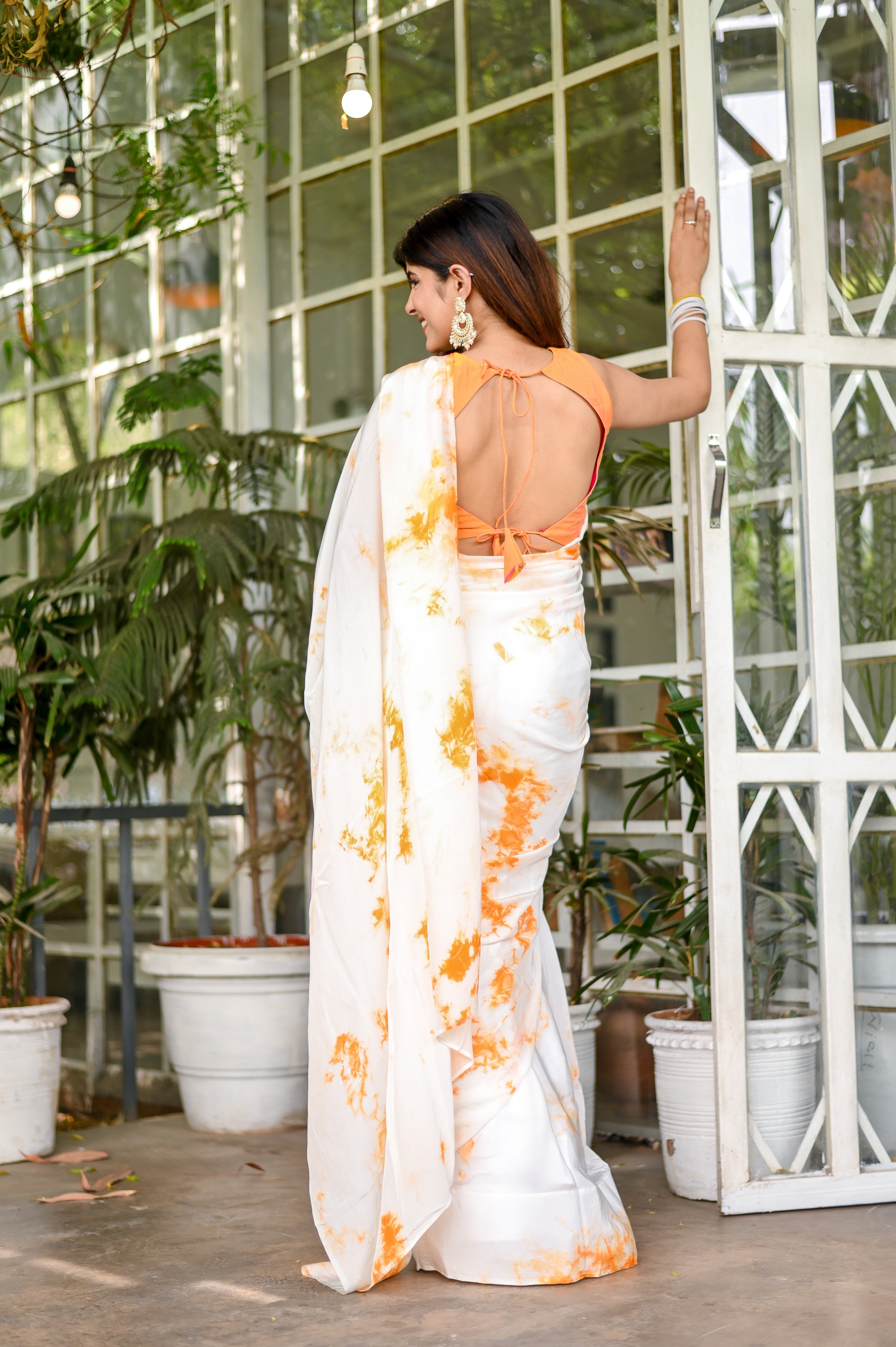 Mesmerizing Orange Satin Shibori Hand Dyed Saree Abstract