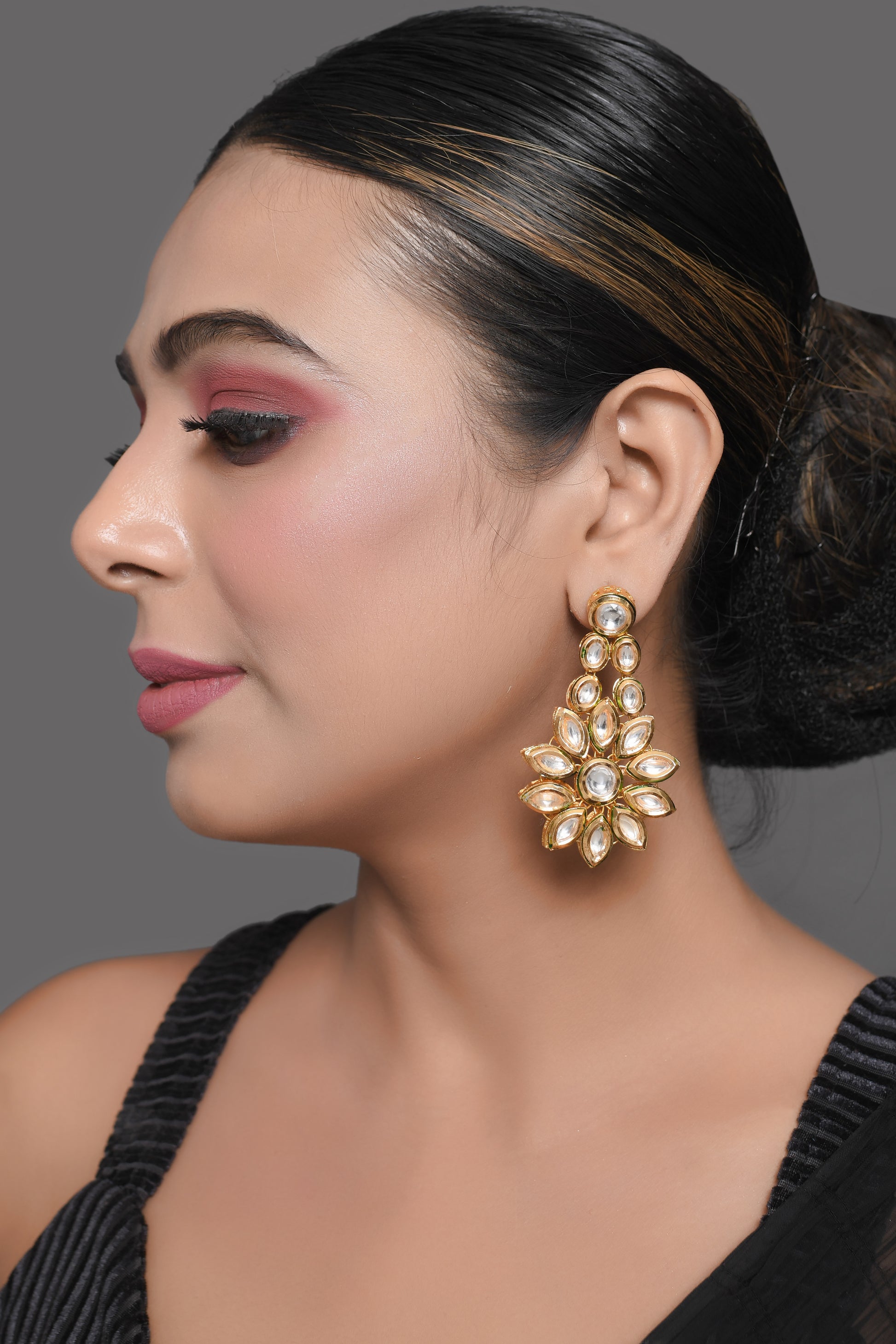 Gold toned Floral Kundan Earrings
