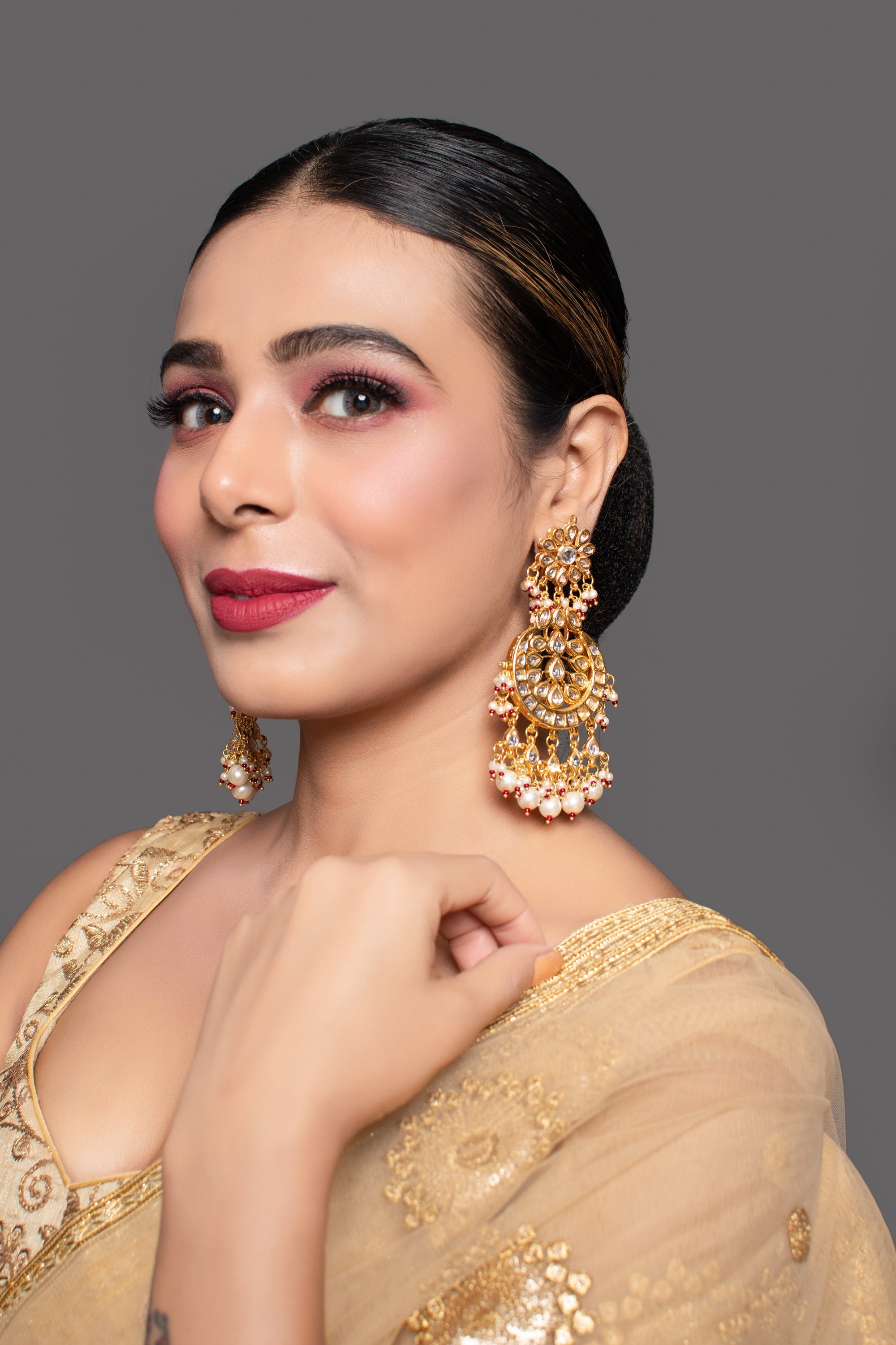 Gold and Red toned Kundan Crescent Shaped earring