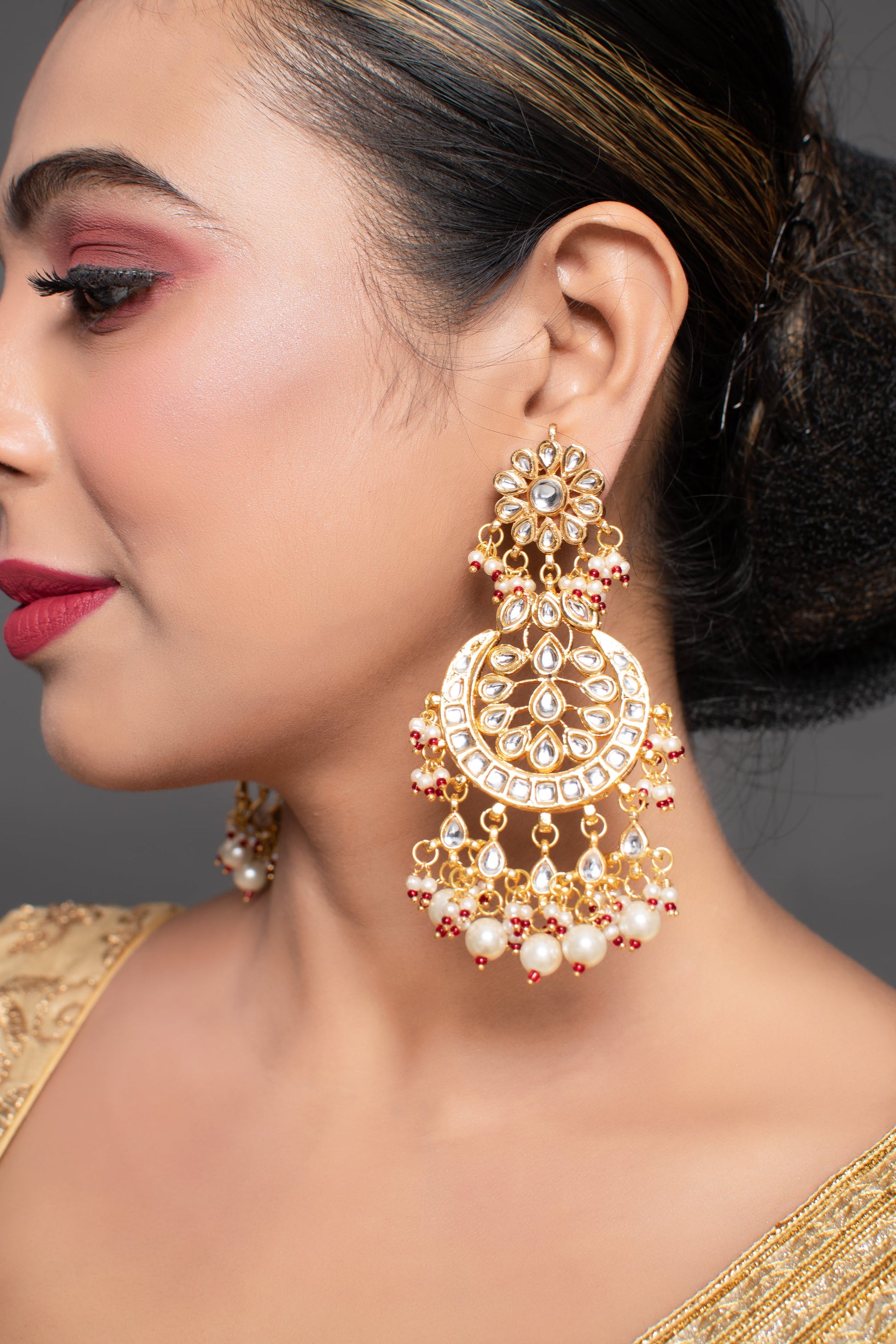 Gold and Red toned Kundan Crescent Shaped earring