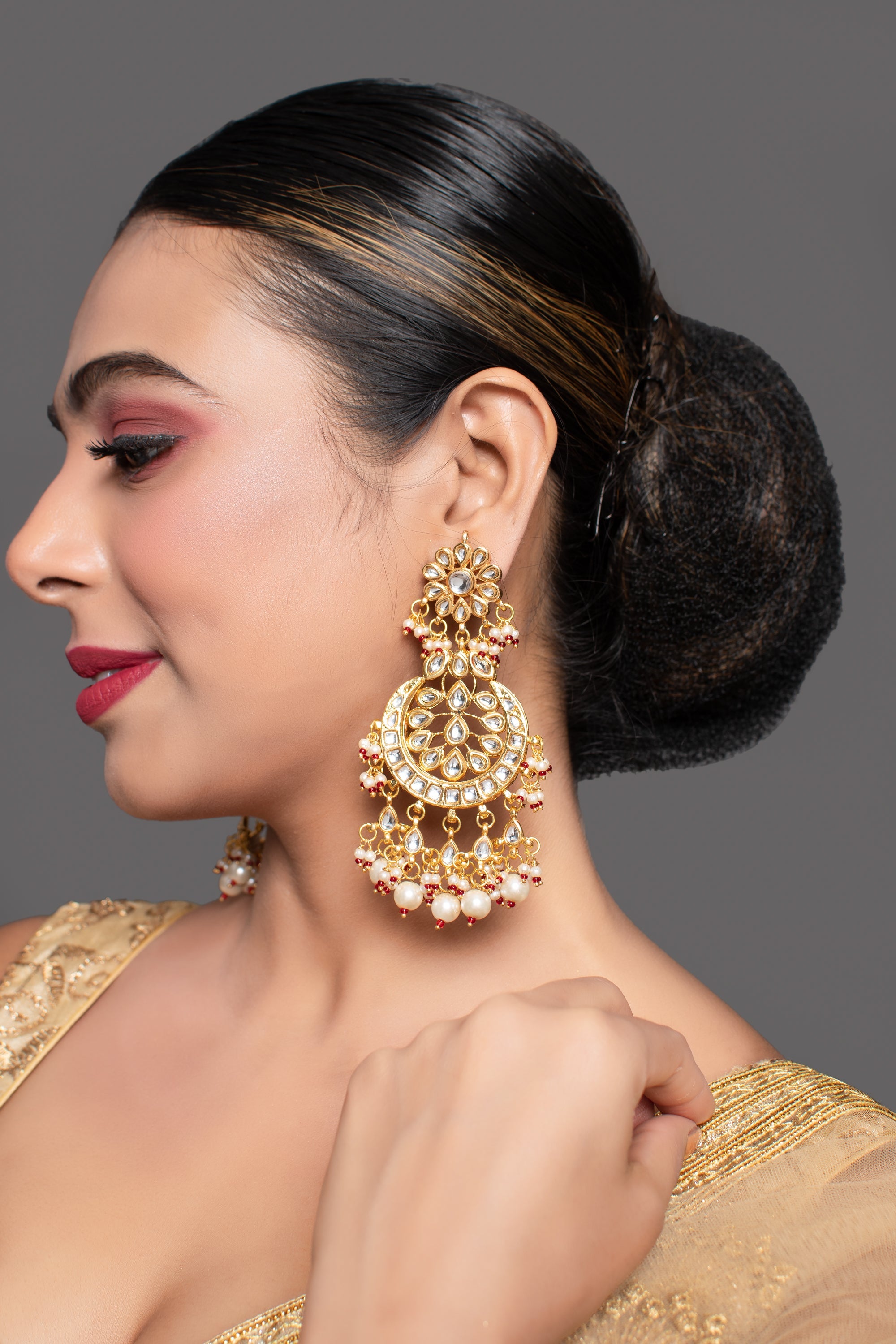 Gold and Red toned Kundan Crescent Shaped earring