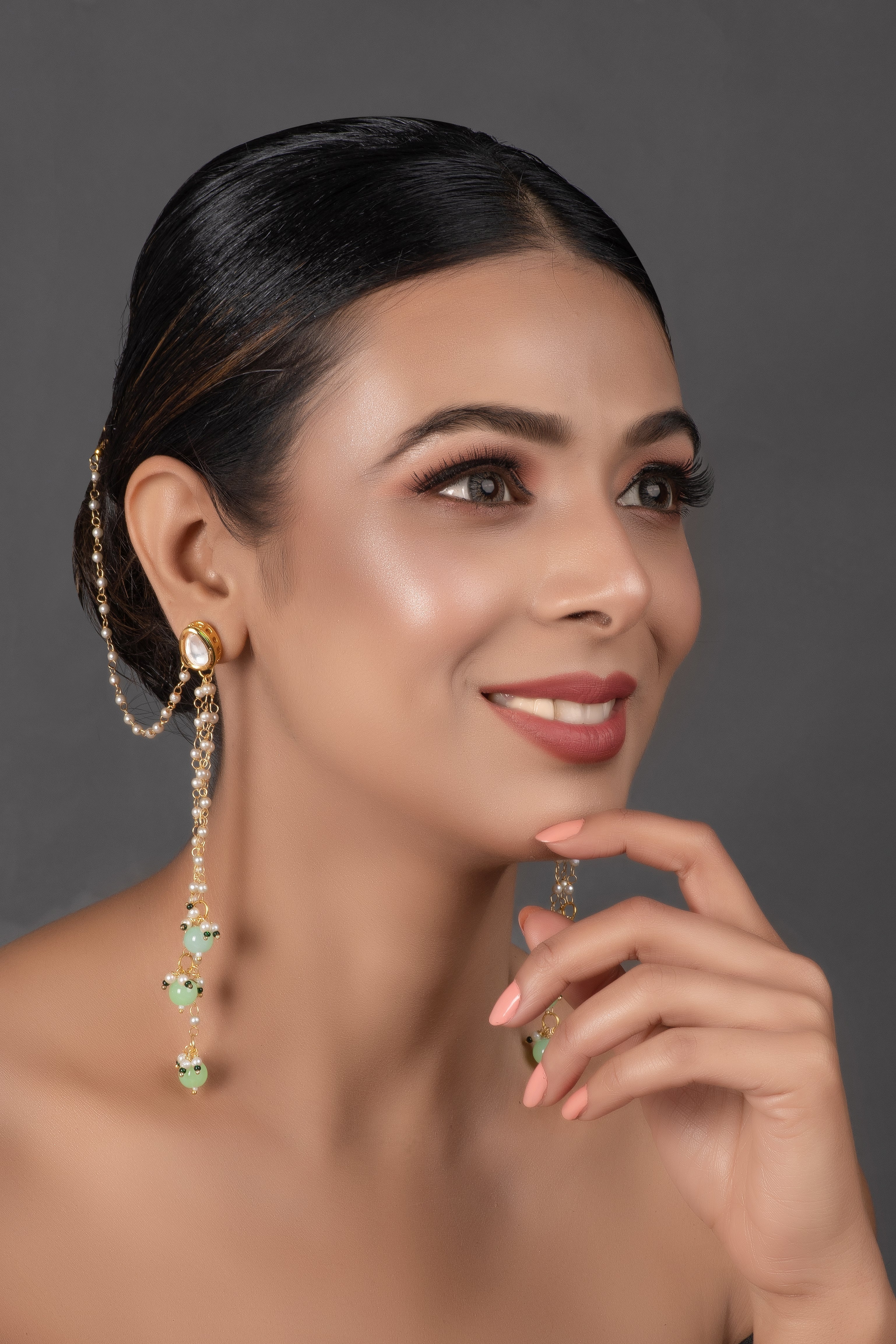 Gold and Green Tone Kundan Inspired Pearl Tassel Earrings with Hair Chain