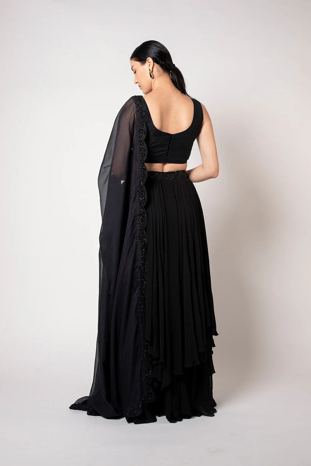 Elegant Black Raw Silk Georgette Self Embroidered Lehenga Set