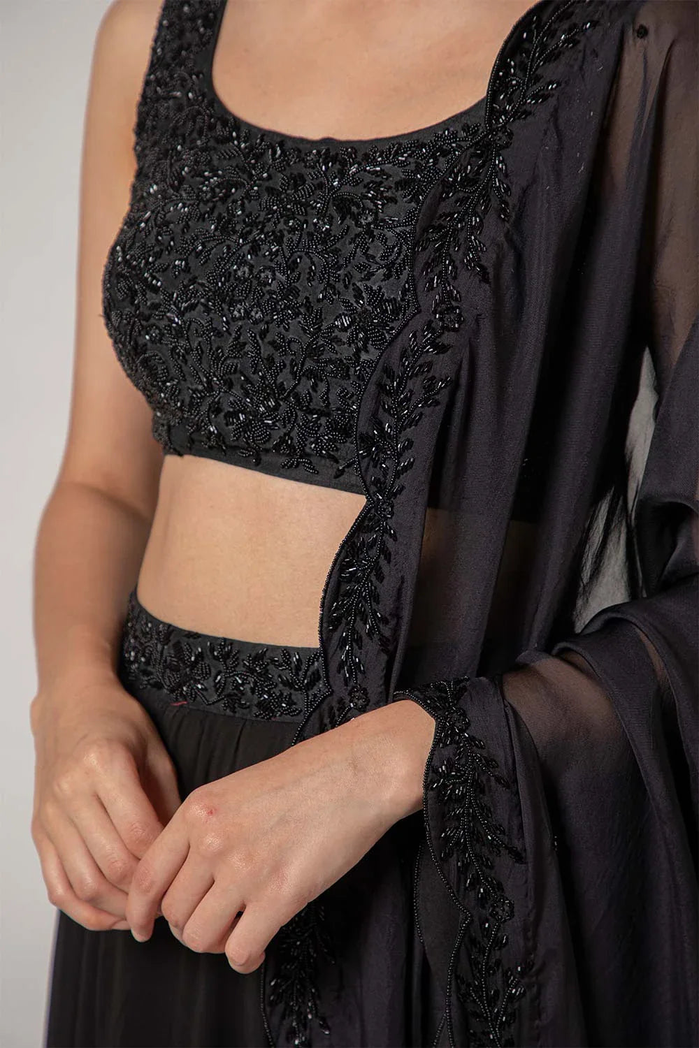 Elegant Black Raw Silk Georgette Self Embroidered Lehenga Set