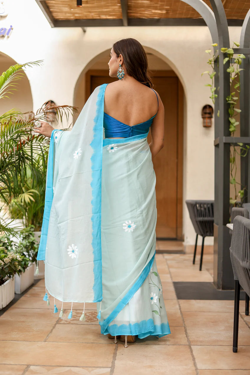 Soothing Aqua Blue Malmal Cotton Handpainted White Floral Saree