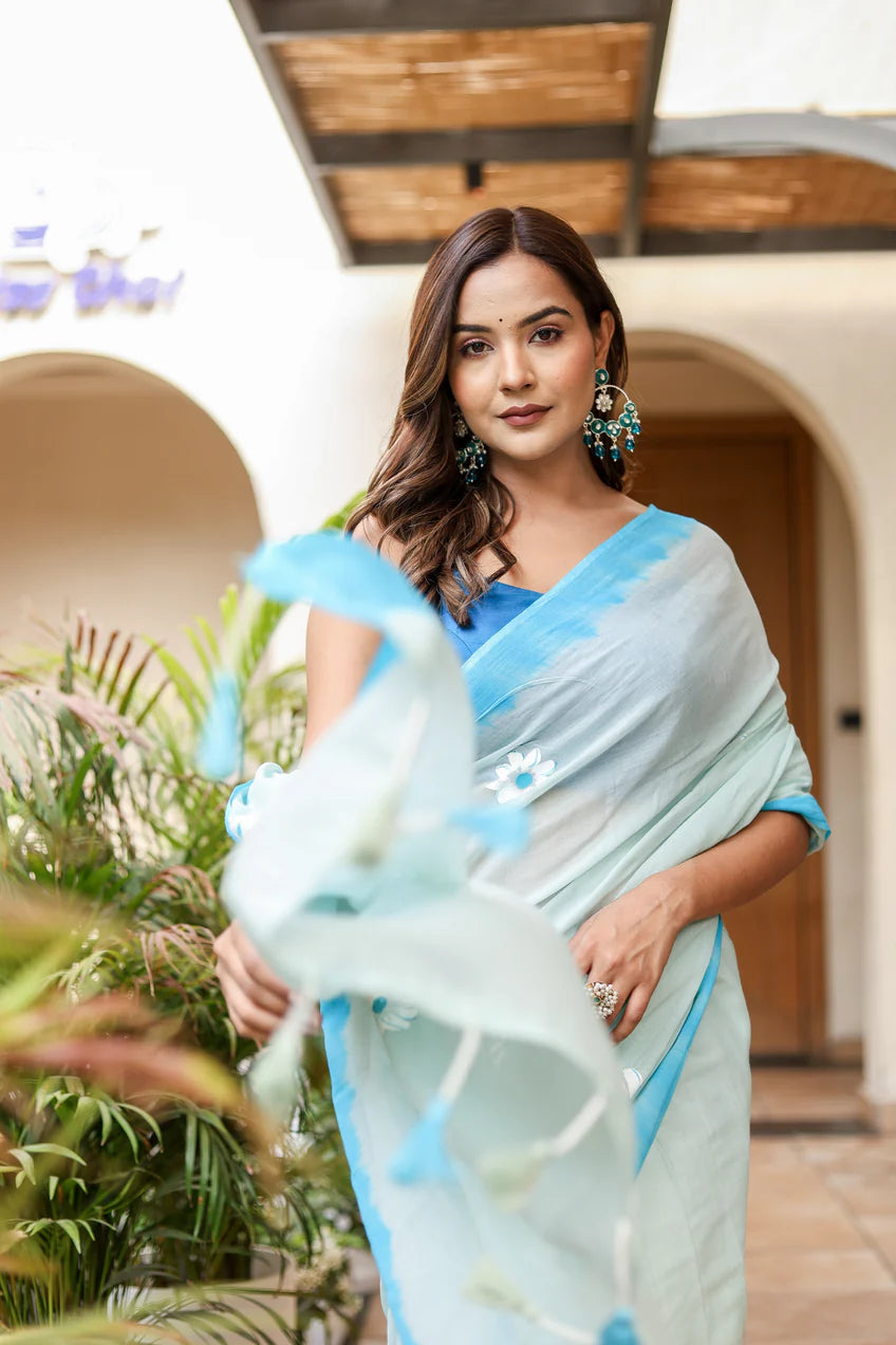 Soothing Aqua Blue Malmal Cotton Handpainted White Floral Saree