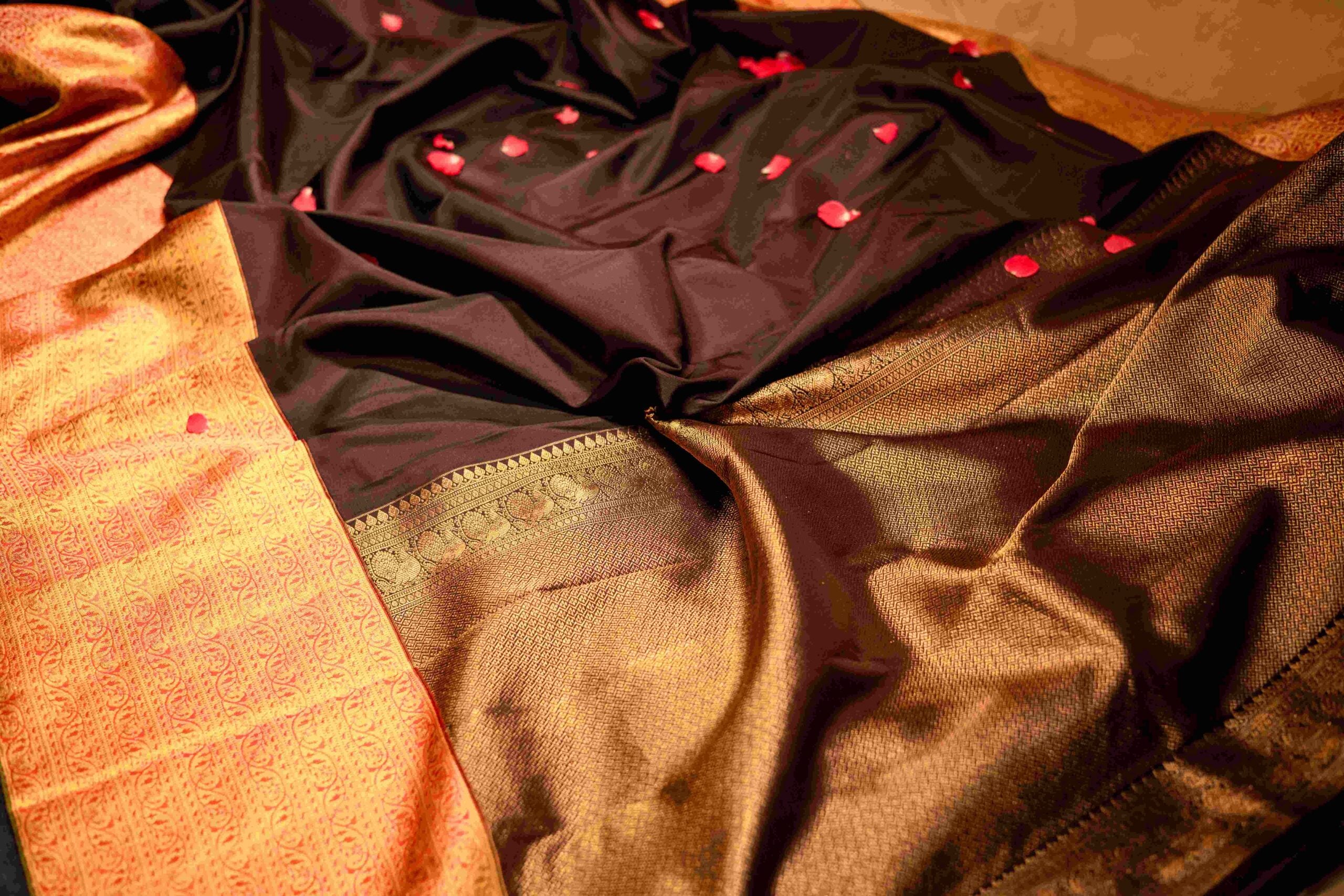 Black Kanchipuram Silk Saree with Intricate Jamdani Border