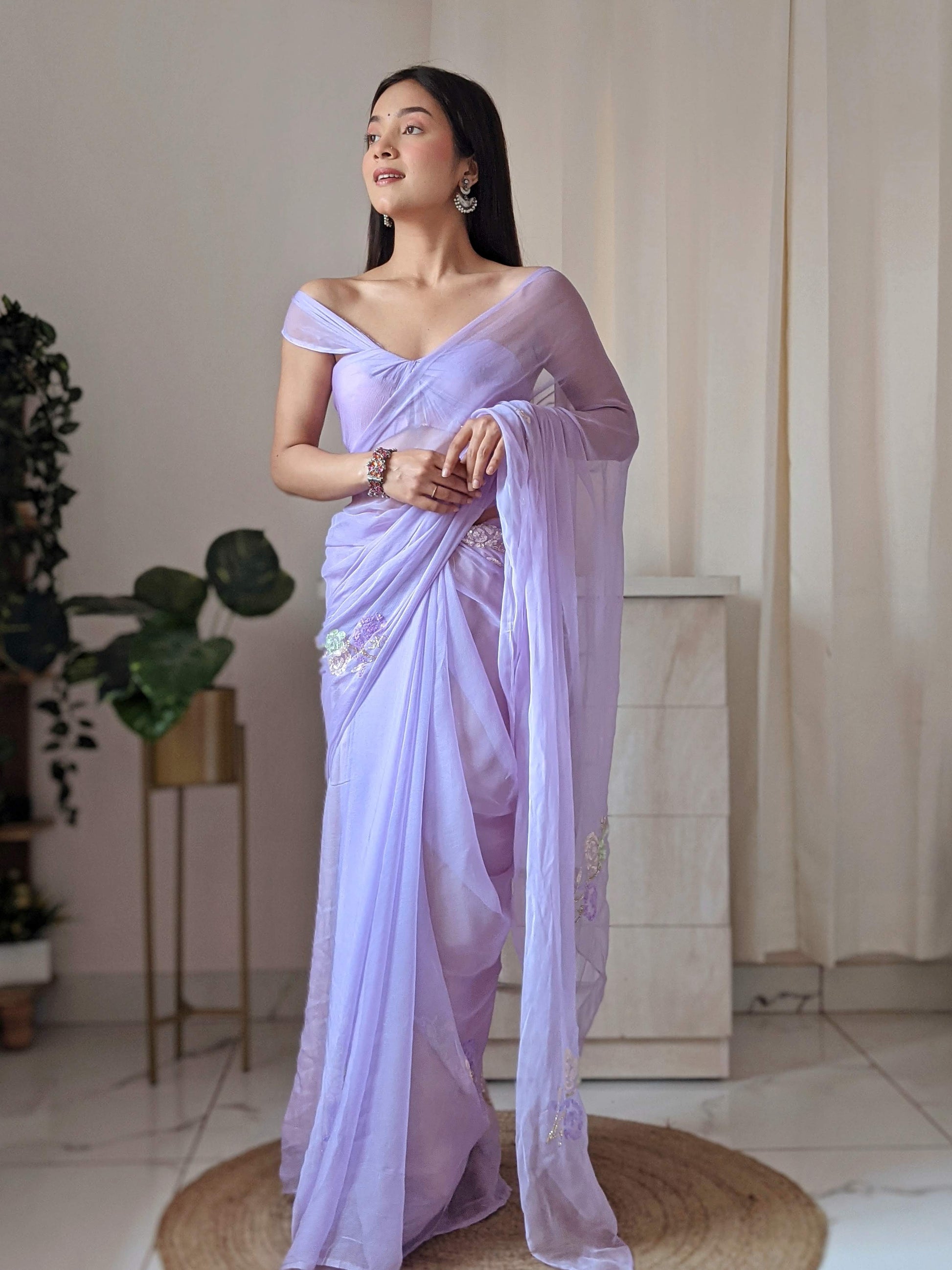 Pretty Lavender Chiffon Saree with Elegant Sequin Buttis