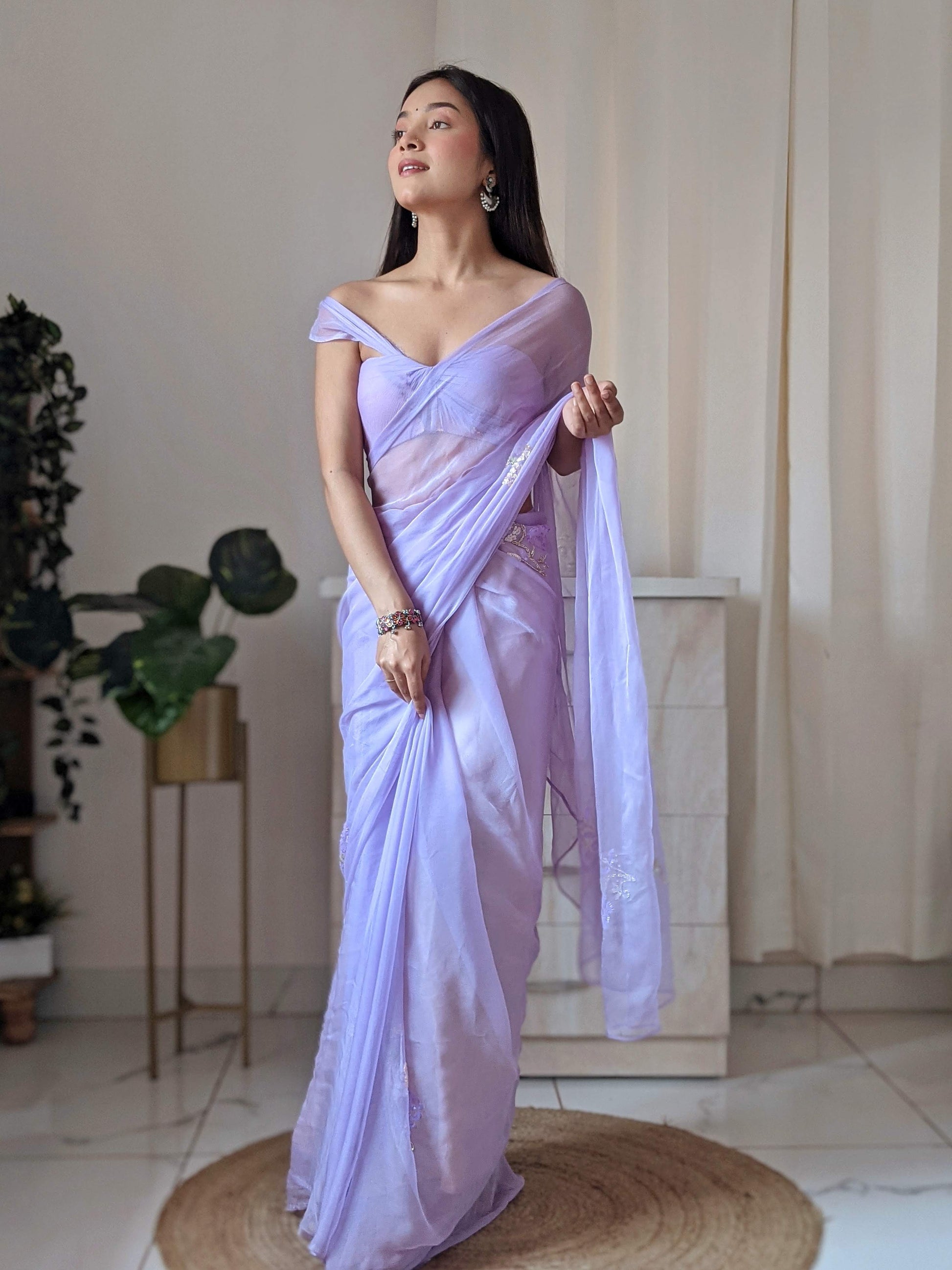 Pretty Lavender Chiffon Saree with Elegant Sequin Buttis