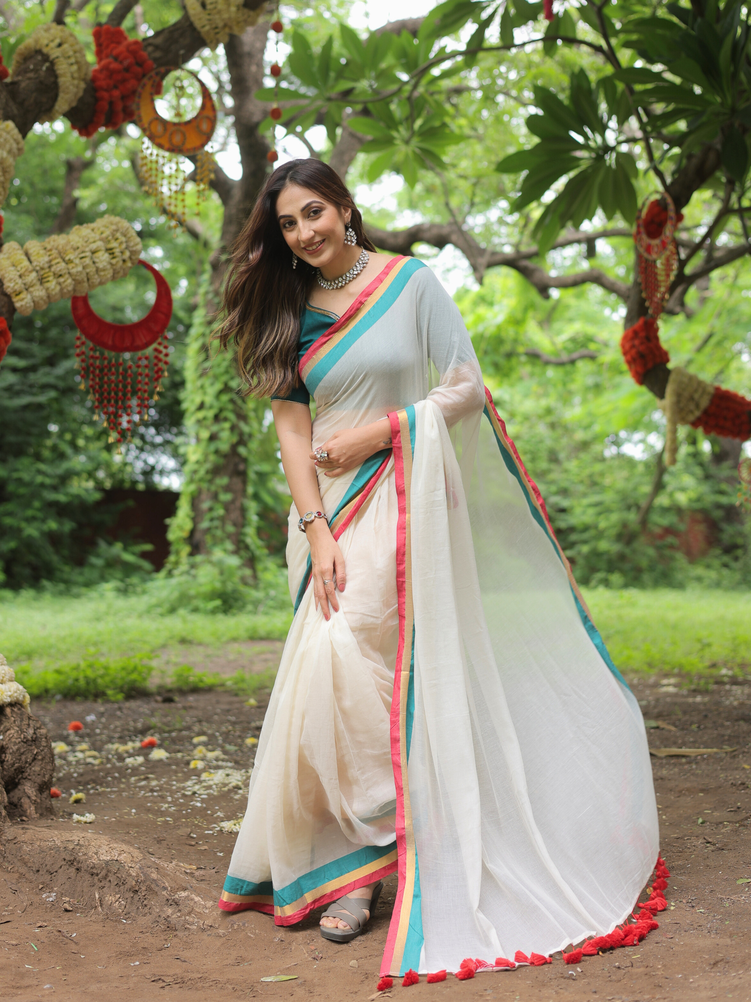Rama ivory cotton saree with embroidered blouse