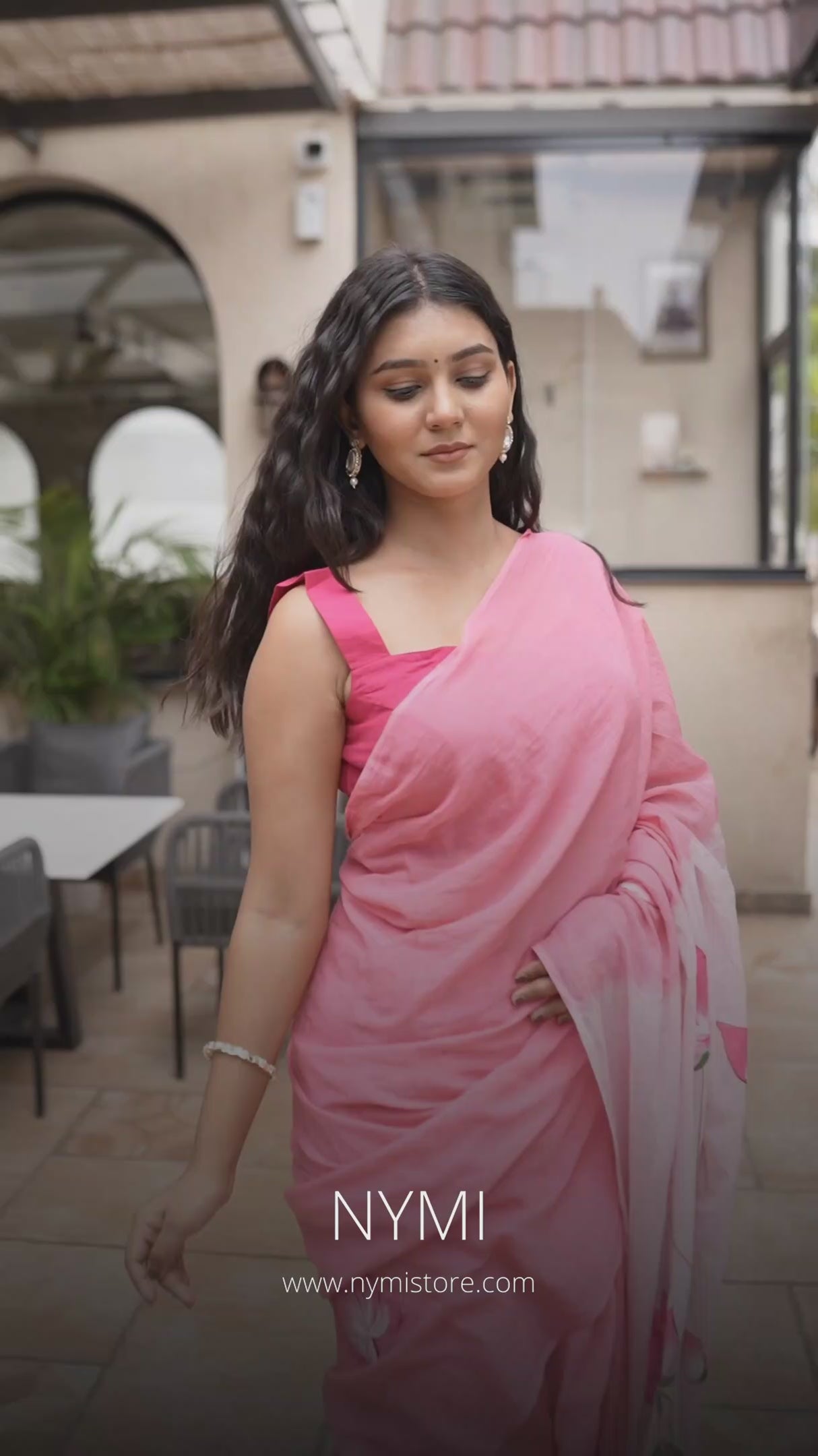 Load video: Elegant Pink Mul Cotton Handpainted Lotus Floral Saree