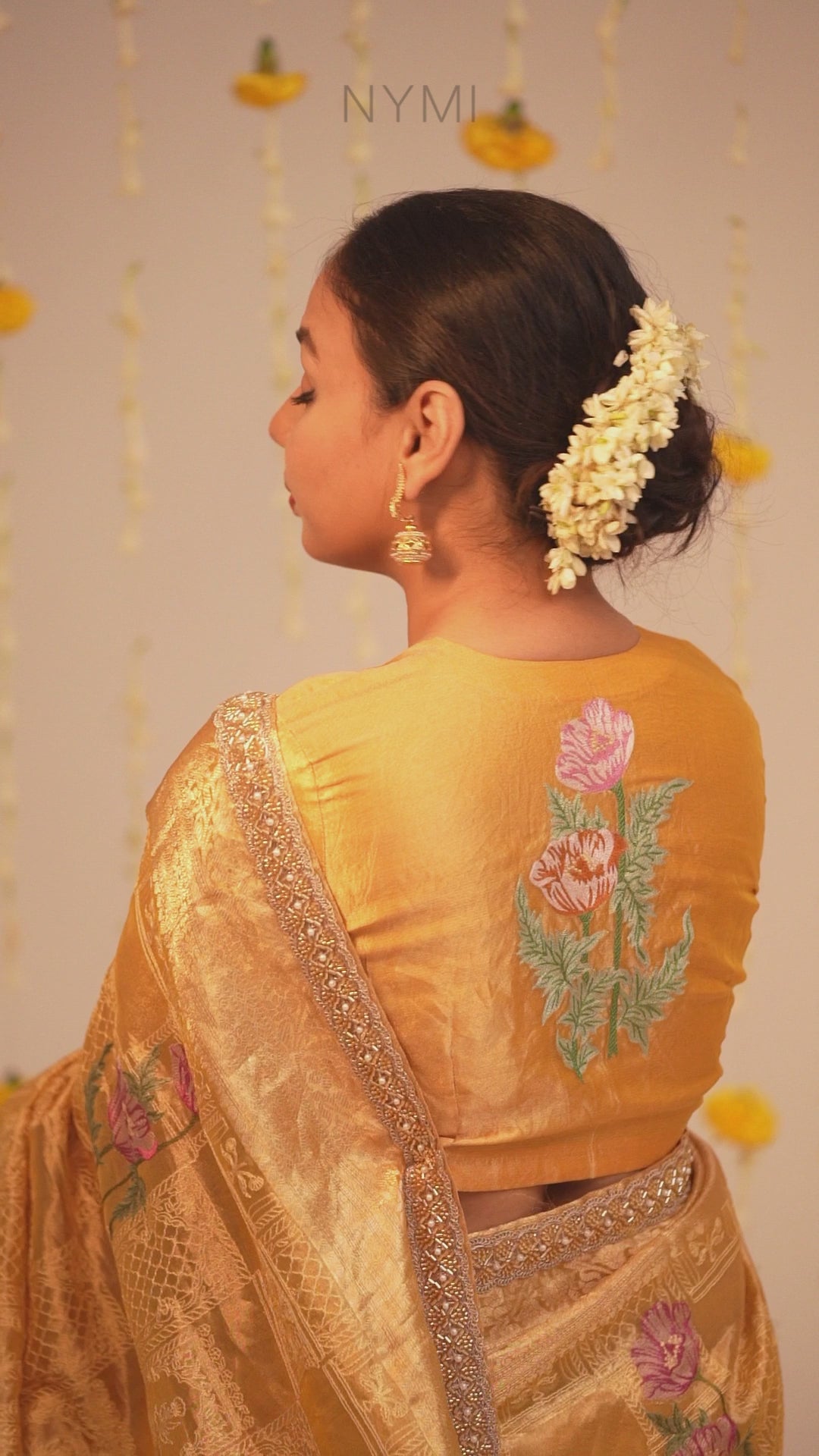 Load video: Mandhaara Kanchani Golden Floral Embroidered Tissue Saree - Handwoven Festive Saree